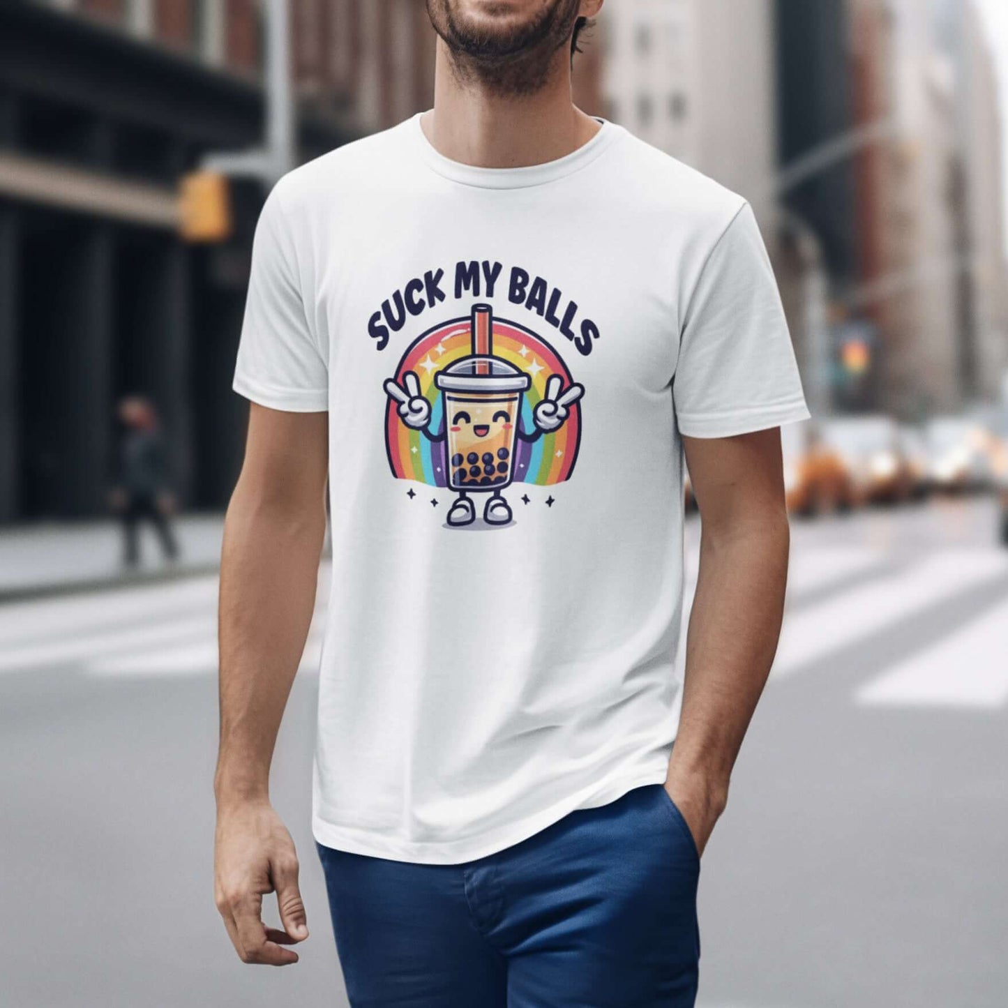 Man wearing a white t-shirt with graphics of a rainbow and a smiling boba bubble tea. The bubble tea has arms and legs. The phrase Suck my balls is printed above the rainbow. The graphics are on the front of the shirt.