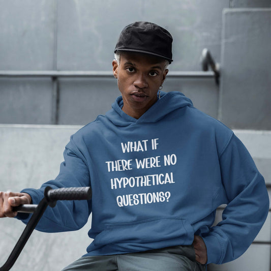 Man sitting in a bmx bike wearing an indigo blue hoodie sweatshirt. The hoodie has the phrase What if there were no hypothetical questions question mark printed on the front.