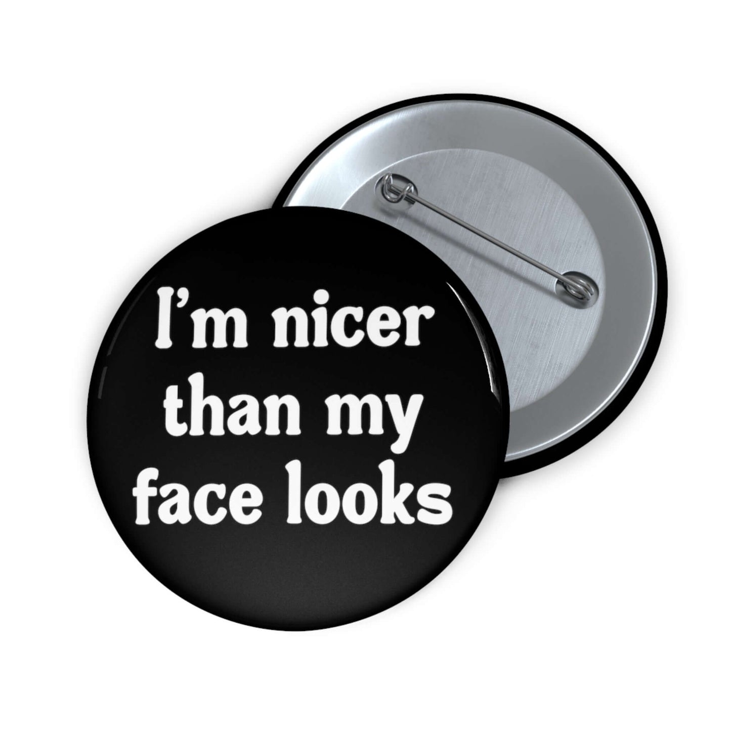 I'm nicer than my face looks pin-back button.