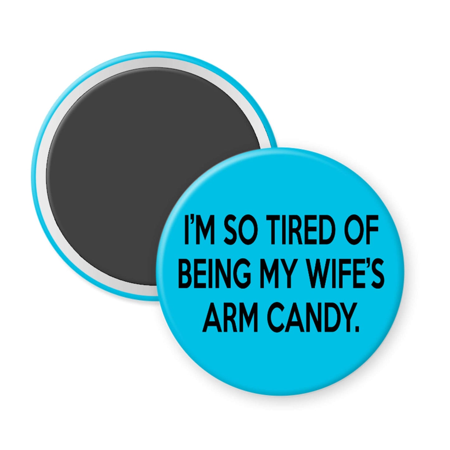 Round blue magnet with humorous text on a white background