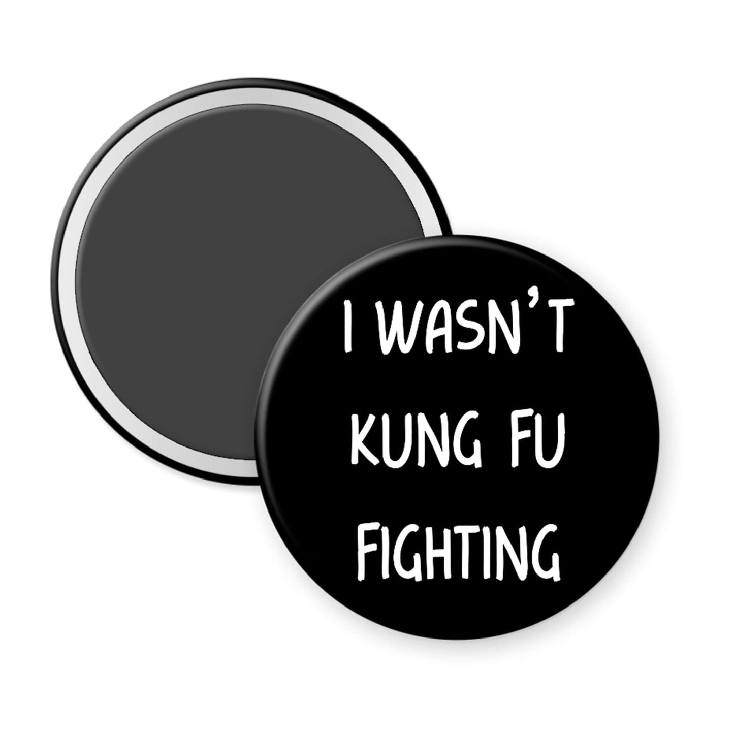 Round black magnet with white text 'I WASN'T KUNG FU FIGHTING' on a white background