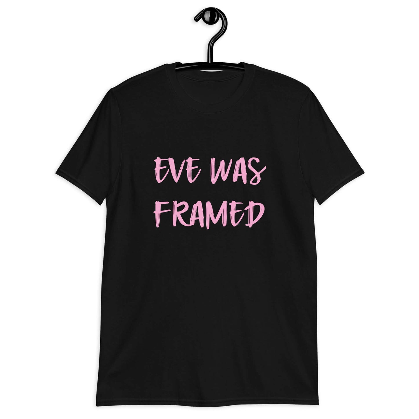 Black t-shirt with the words Eve was framed printed on the front in pink.