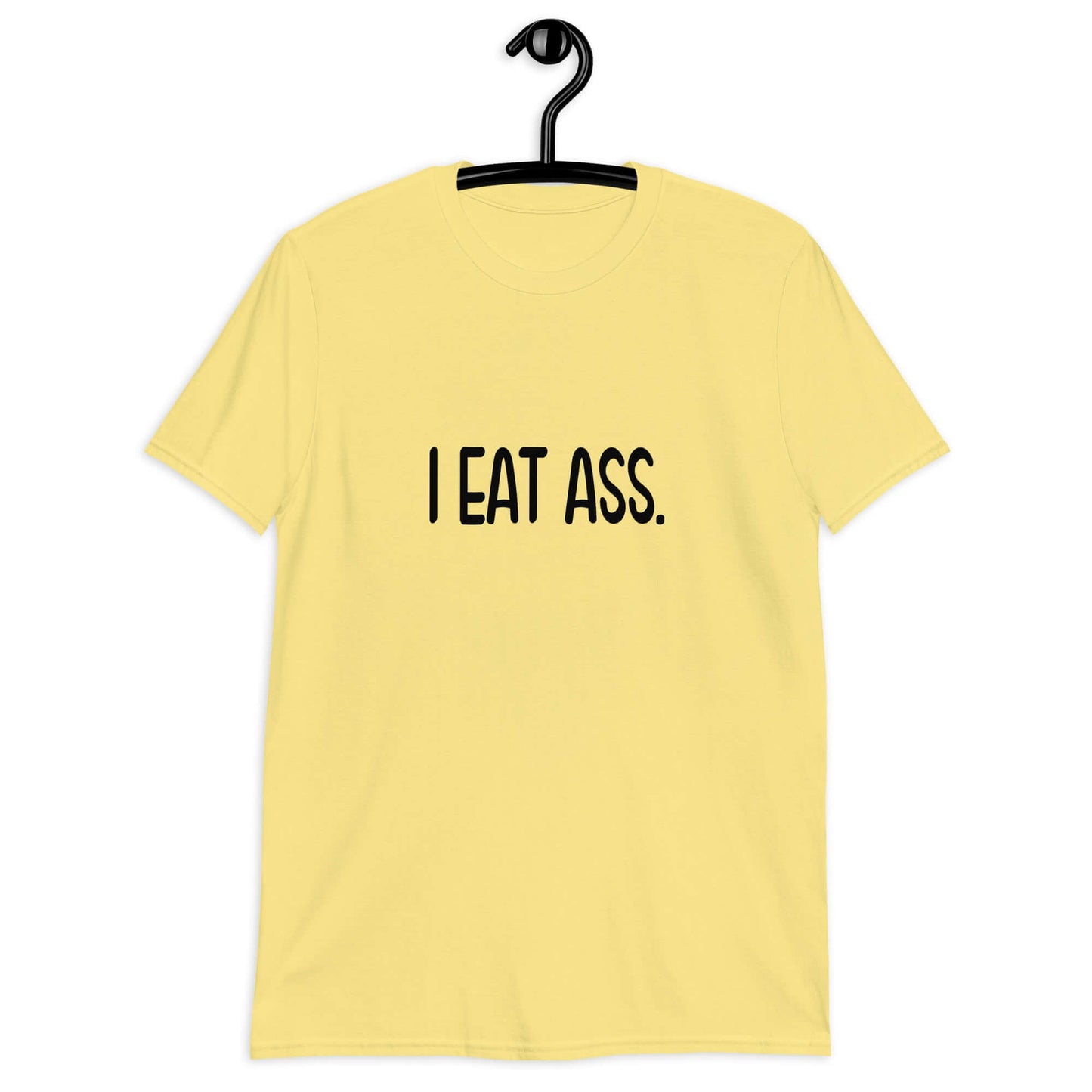 Cornsilk yellow t-shirt with the phrase I eat ass printed on the front.