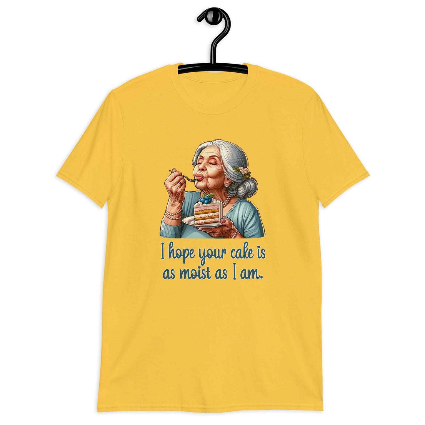 Daisy yellow t-shirt with image of grey haired older woman enjoying a bite of a piece of cake with the words I hope your cake is as moist as I am printed on the front.