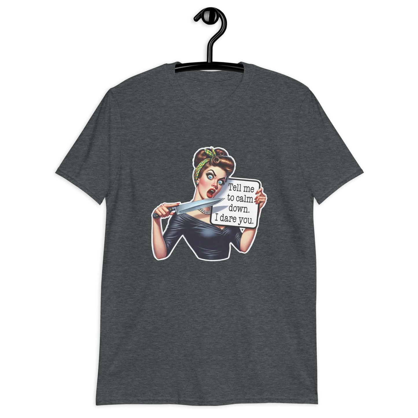 Dark heather t-shirt displayed on a hanger. The t-shirt has a graphic of an angry looking retro woman holding a knife and a sign. The sign says Tell me to calm down I dare you. The graphic is printed on the front of the shirt.