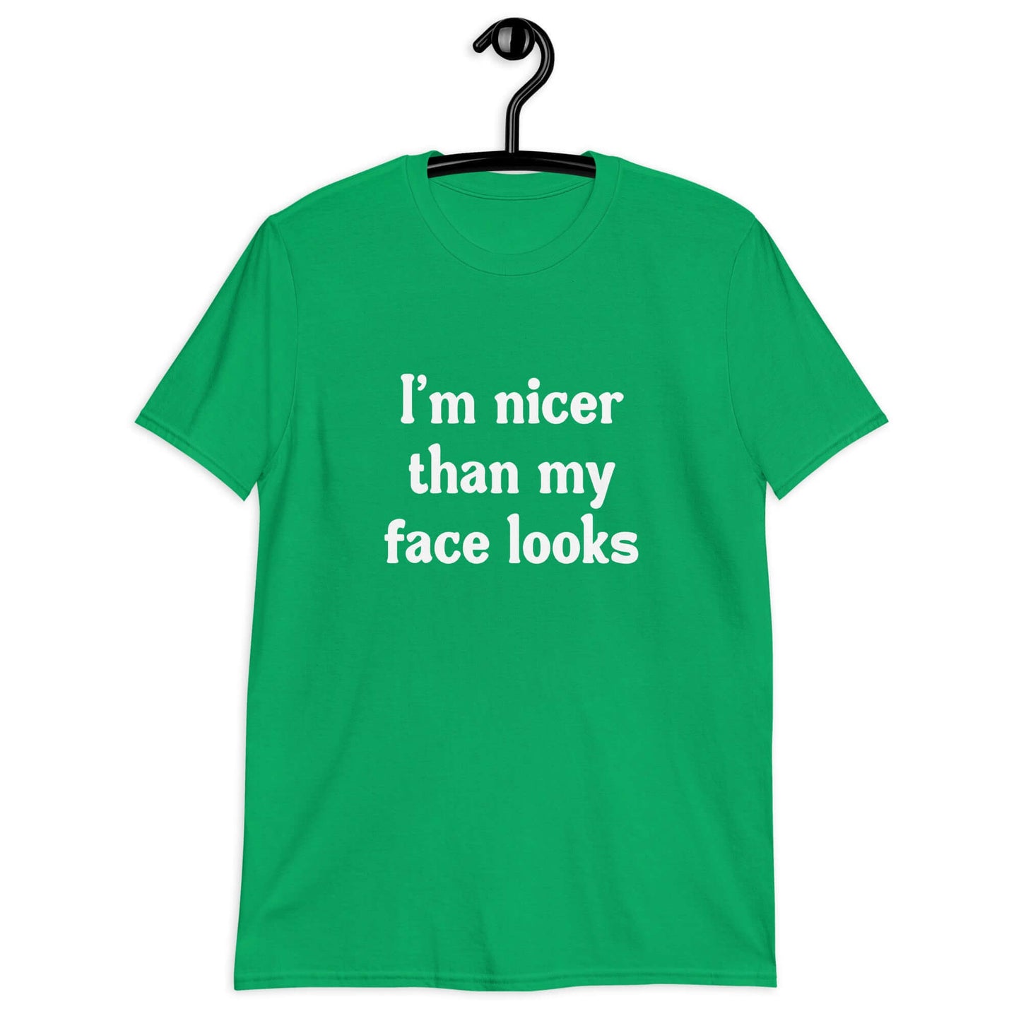 Irish green t-shirt with the phrase I'm nicer than my face looks printed on the front.