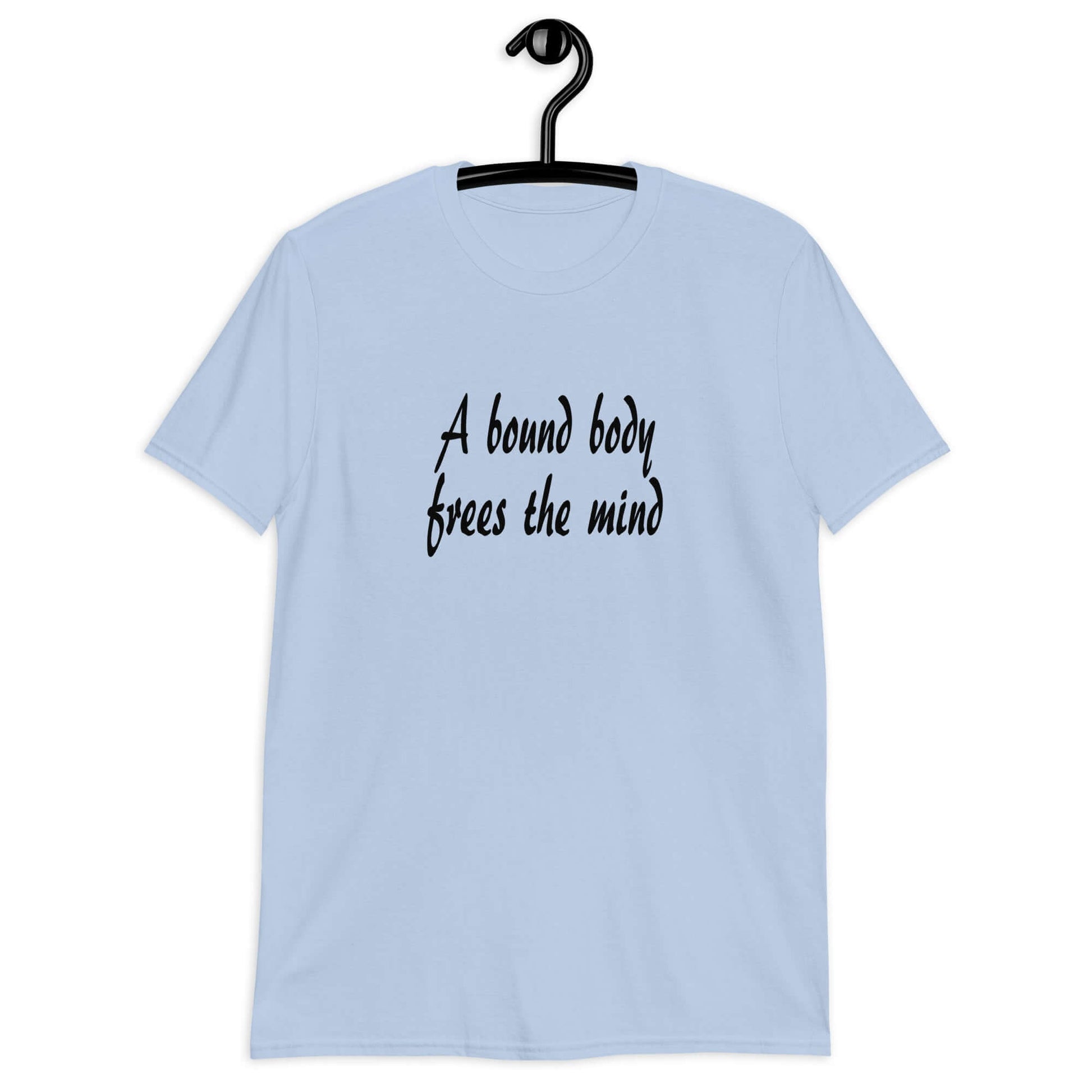 Light blue t-shirt with the phrase A bound body frees the mind printed on the front.