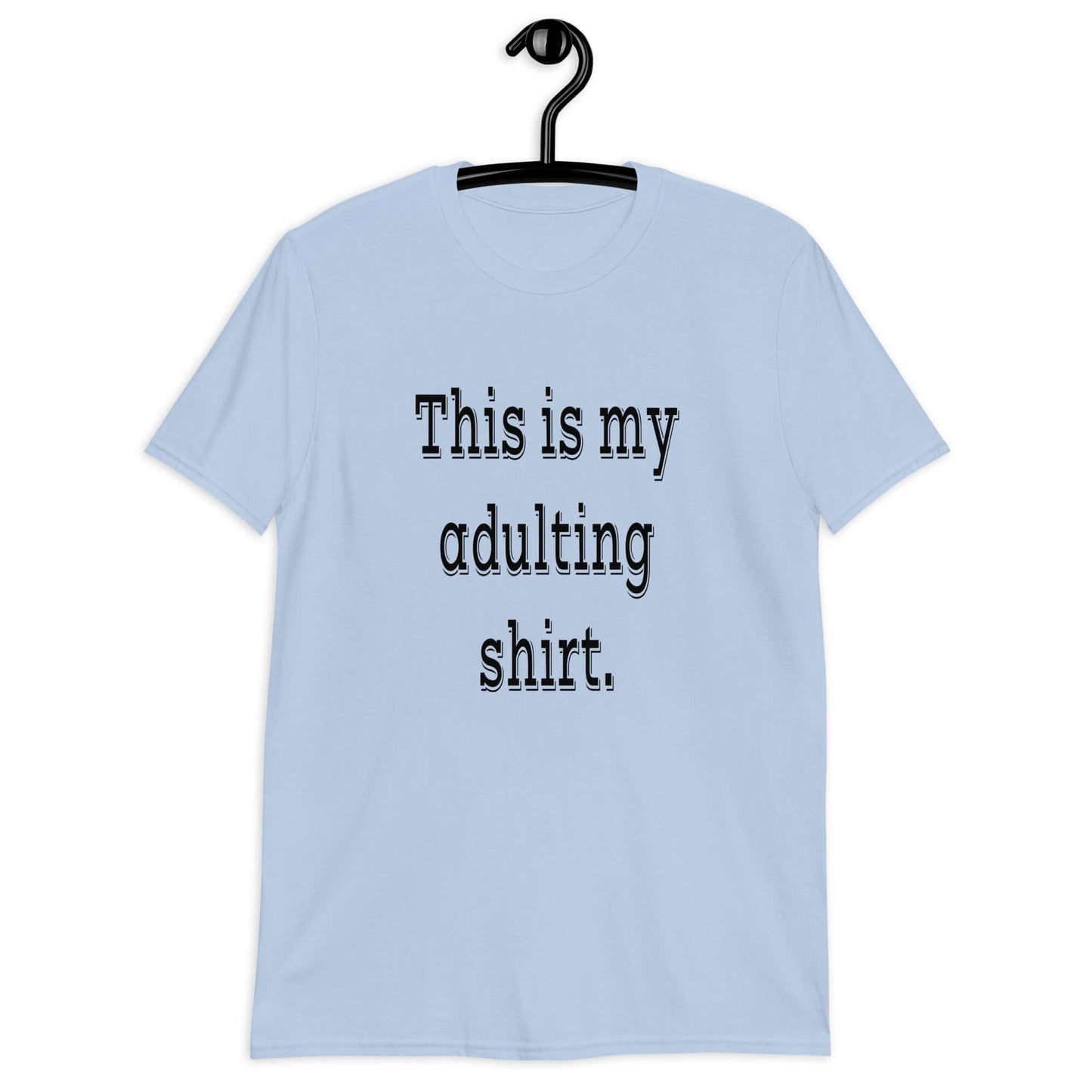 Light blue t-shirt with the phrase This is my adulting shirt printed on the front.