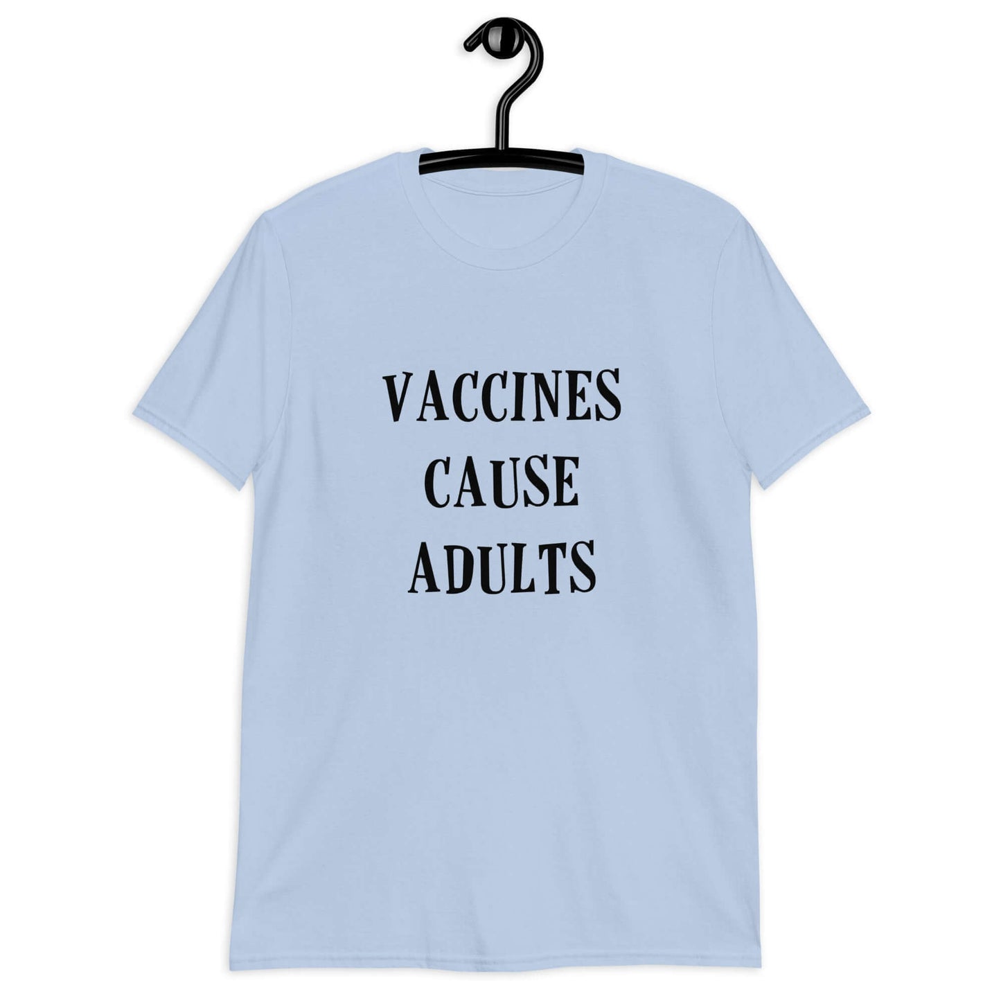 Light blue t-shirt with the phrase Vaccines cause adults printed on the front.