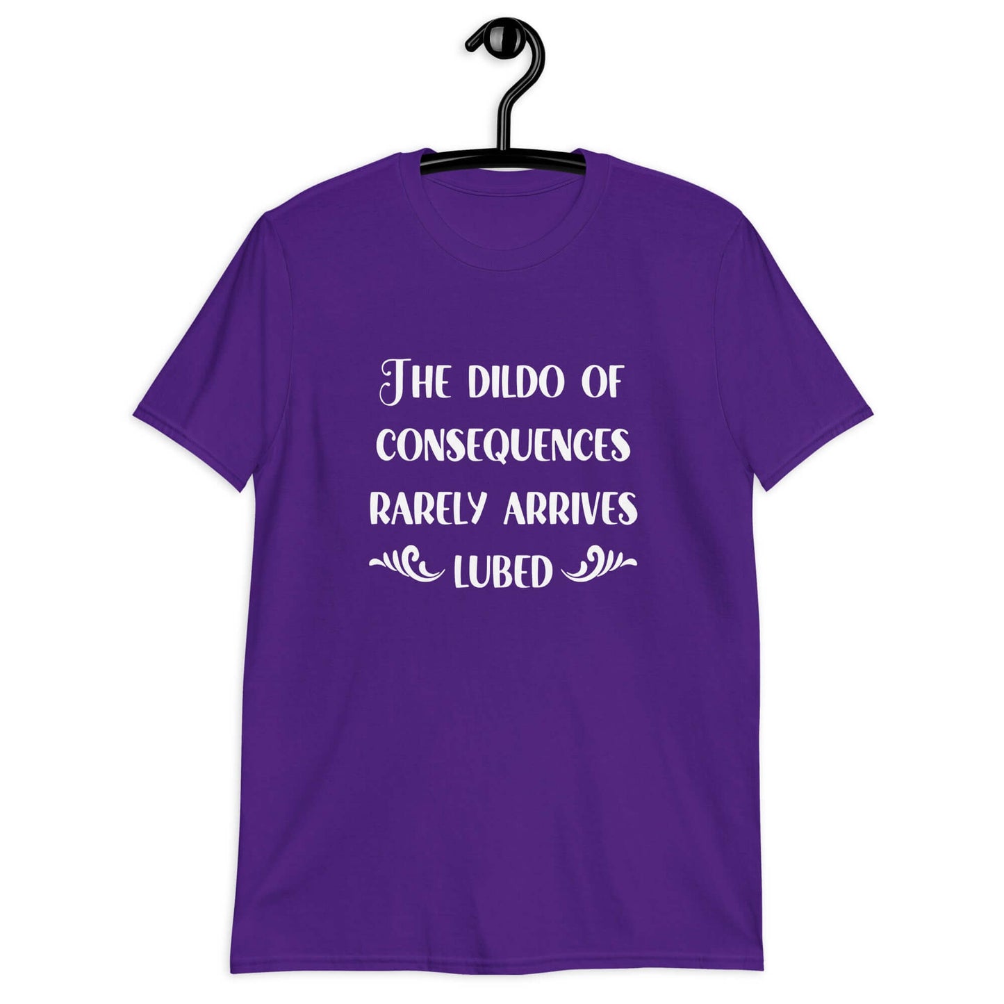 Purple t-shirt with the phrase The dildo of consequences rarely arrives lubed printed on the front.