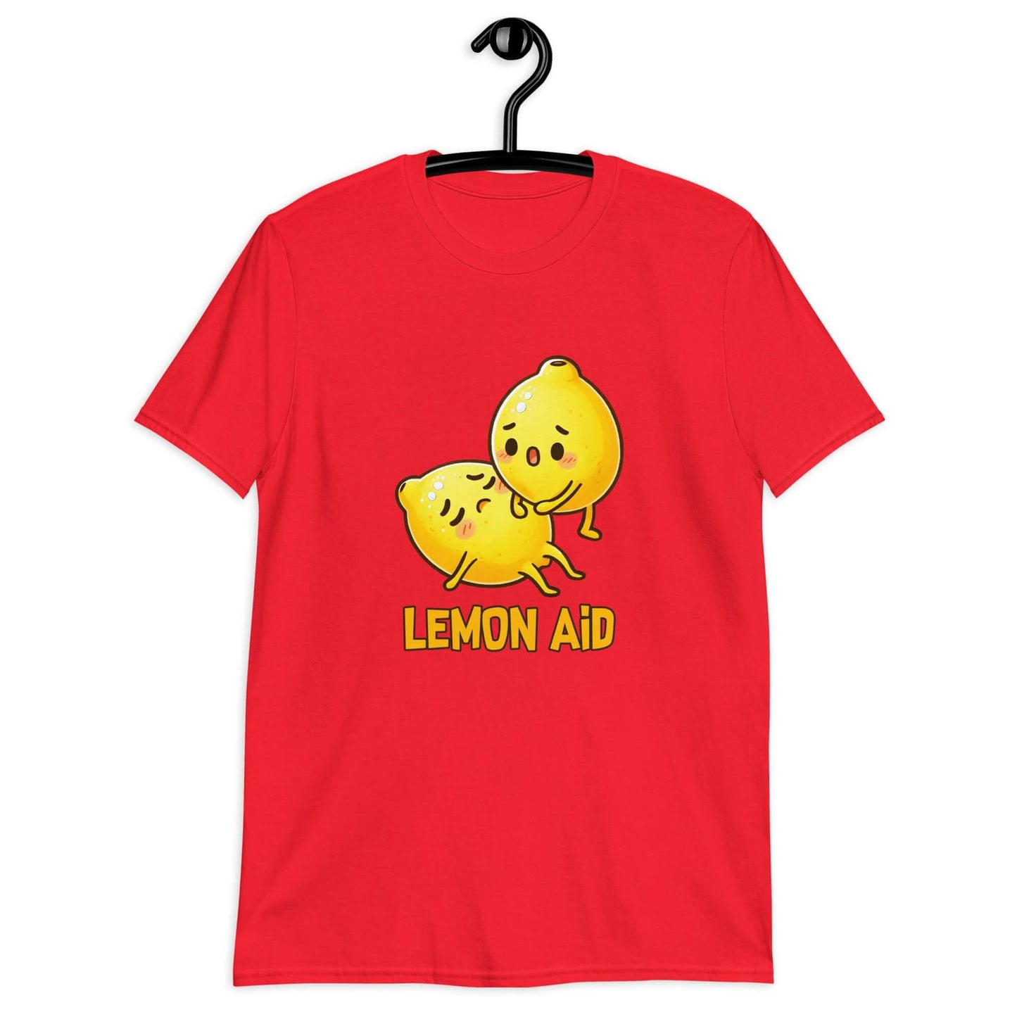 Red t-shirt with image of 2 cartoon lemons. One lemon is giving the other lemon CPR. The words Lemon Aid is under the lemons. The graphic is printed on the front.