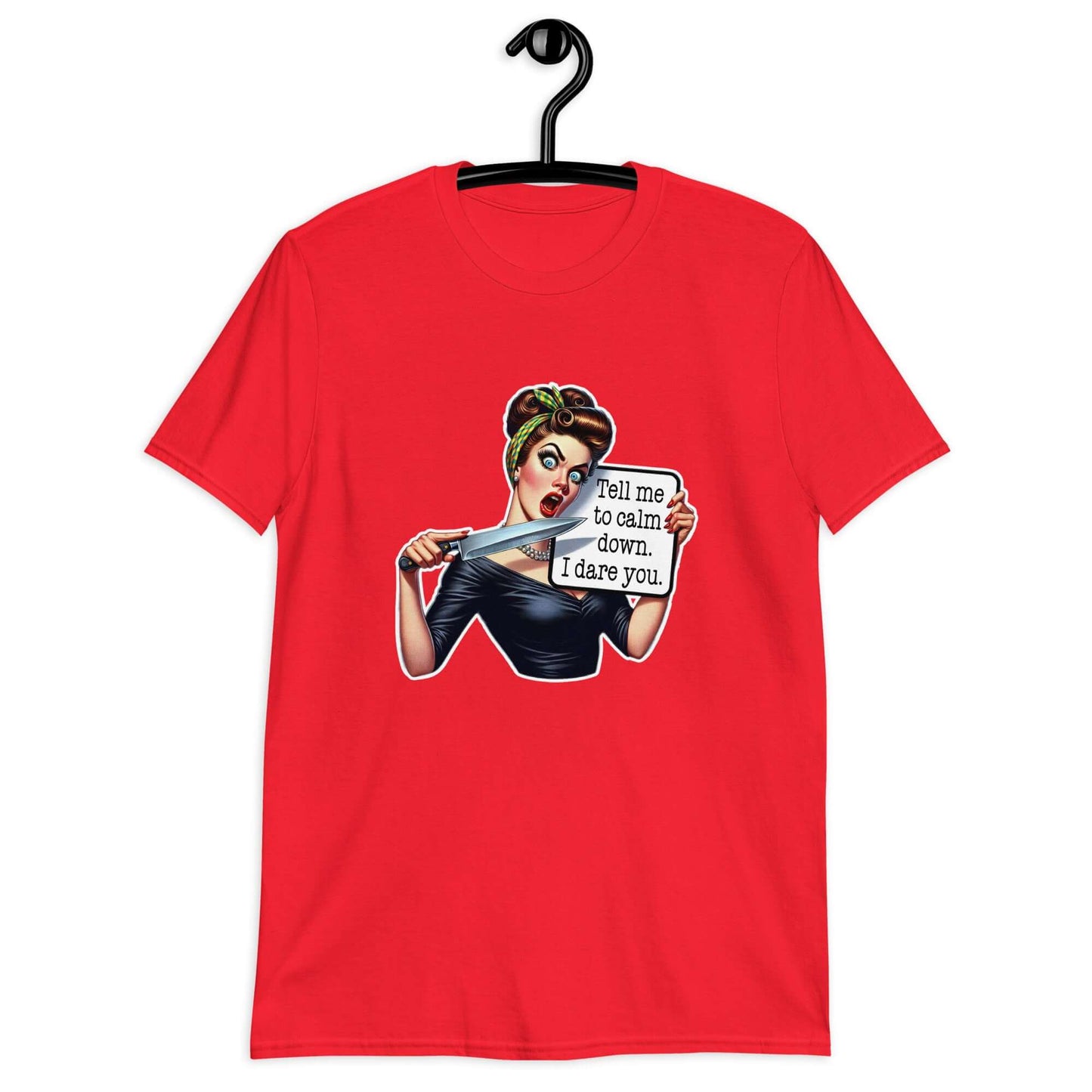 Red t-shirt displayed on a hanger. The t-shirt has a graphic of an angry looking retro woman holding a knife and a sign. The sign says Tell me to calm down I dare you. The graphic is printed on the front of the shirt.
