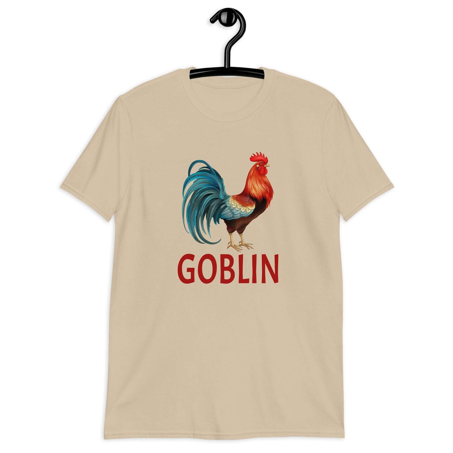 Sand t-shirt with an image of a rooster and the word Goblin printed under the rooster. The graphics are printed on the front of the shirt.