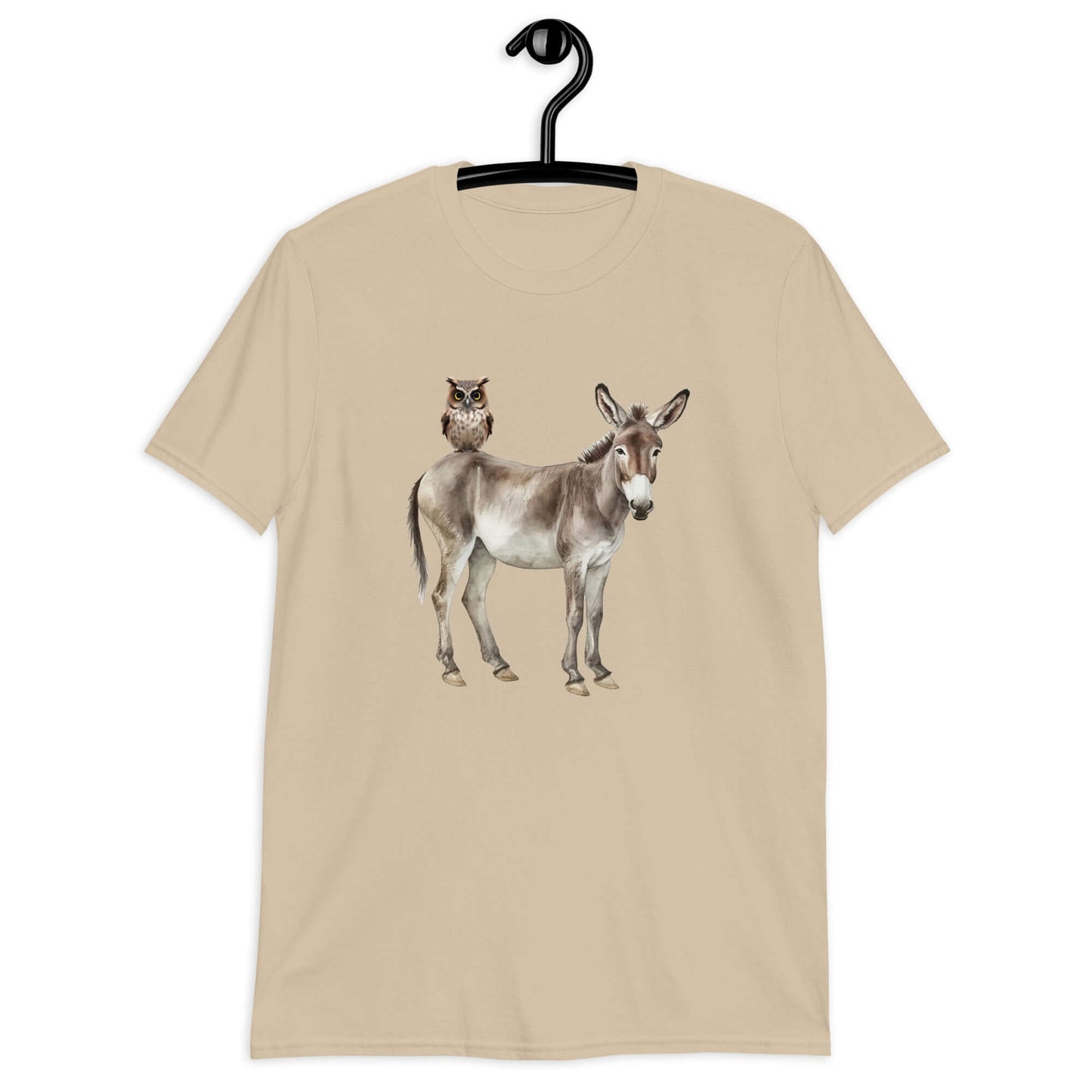Sand color t-shirt with an image of a donkey with wise owl sitting on it printed on the front.