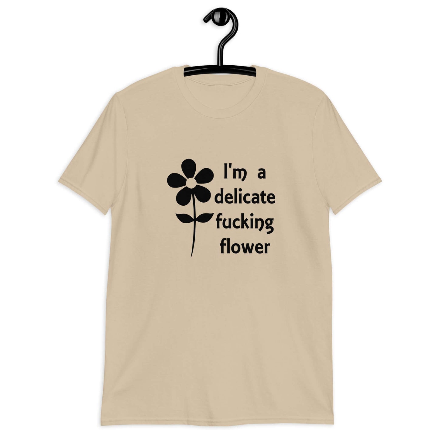 Sand color t-shirt with image of a flower and the phrase I'm a delicate fucking flower printed on the front.