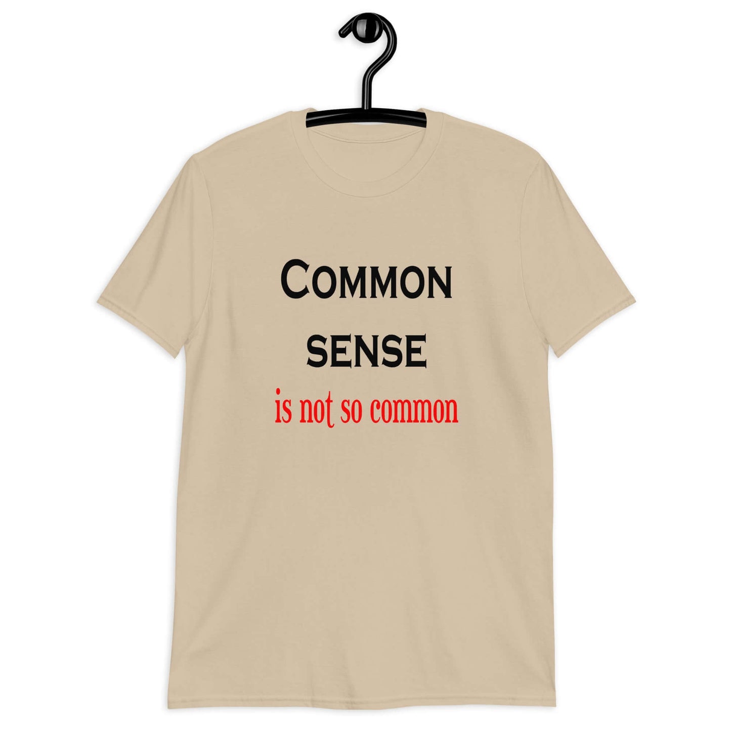 Sand color t-shirt with the phrase Common sense is not so common printed on the front.