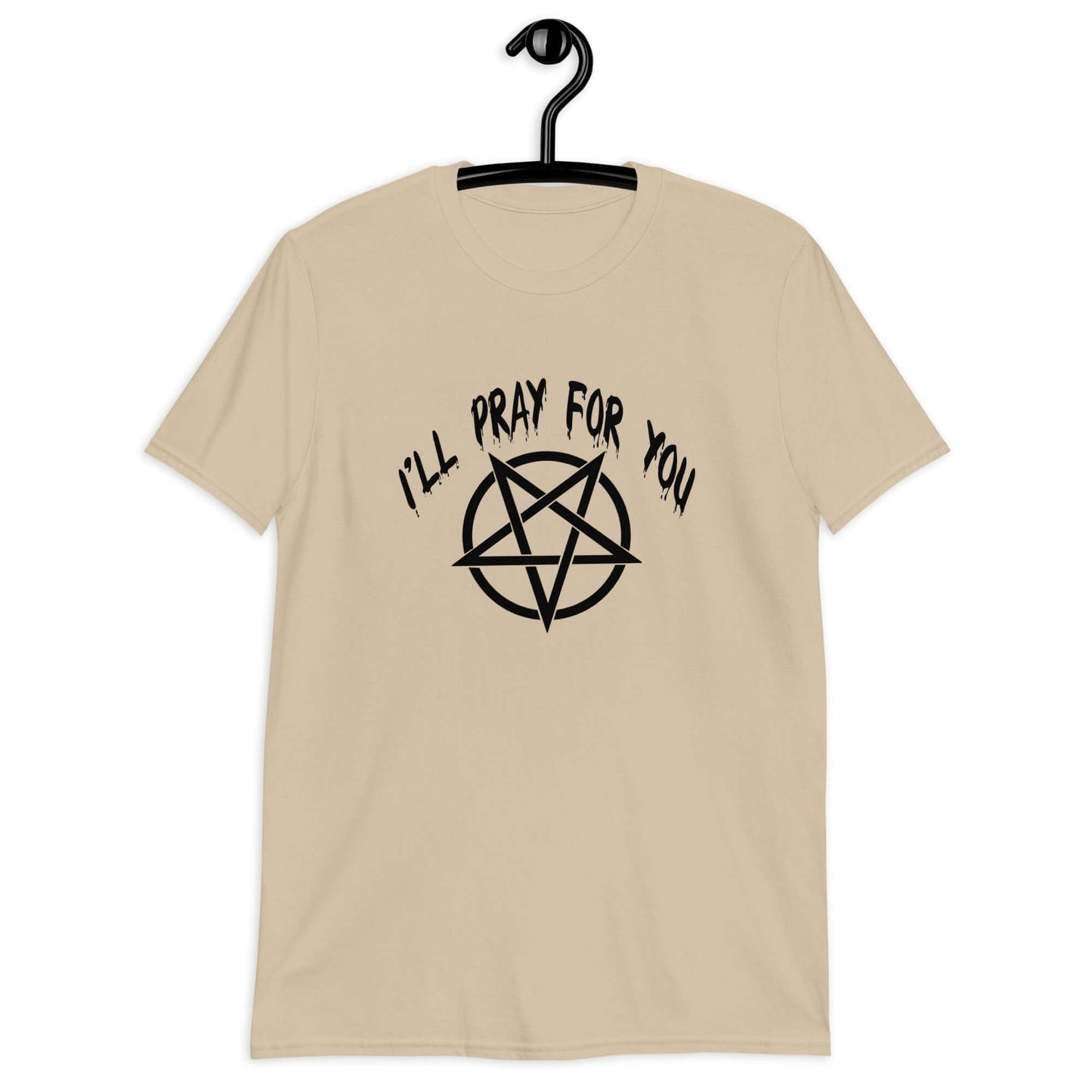 Sand color t-shirt with image of a pentagram and the phrase I'll pray for you printed on the front.