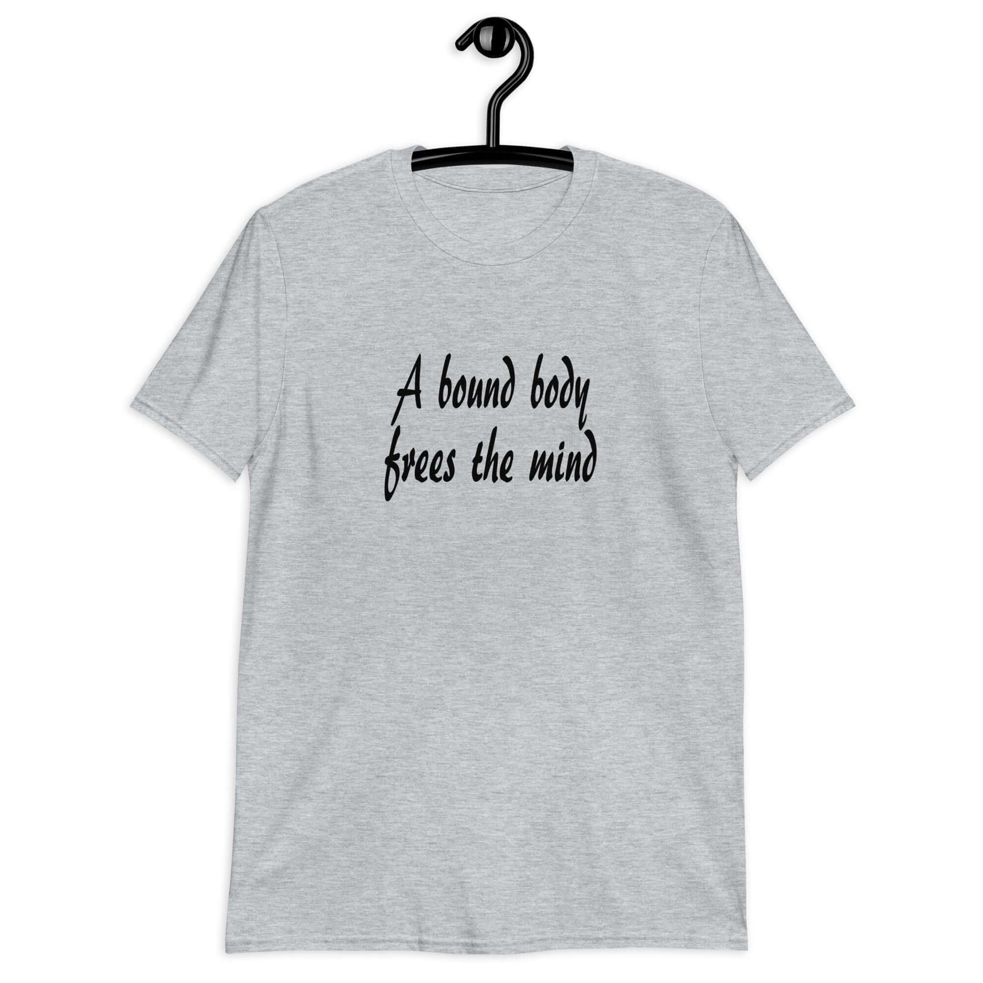 Sport grey t-shirt with the phrase A bound body frees the mind printed on the front.