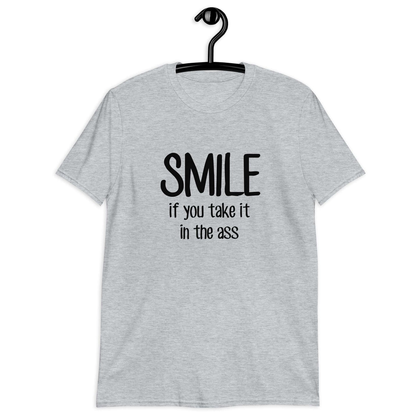 Sport grey t-shirt with the phrase Smile if you take it in the ass printed on the front. The word smile is large and the words take it in the ass are much smaller.
