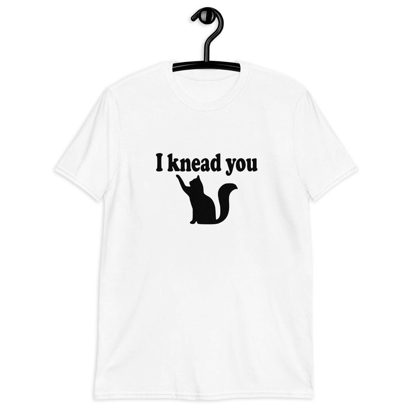 White t-shirt that has an image of a silhouette of a cat and the words I knead you printed on the front.