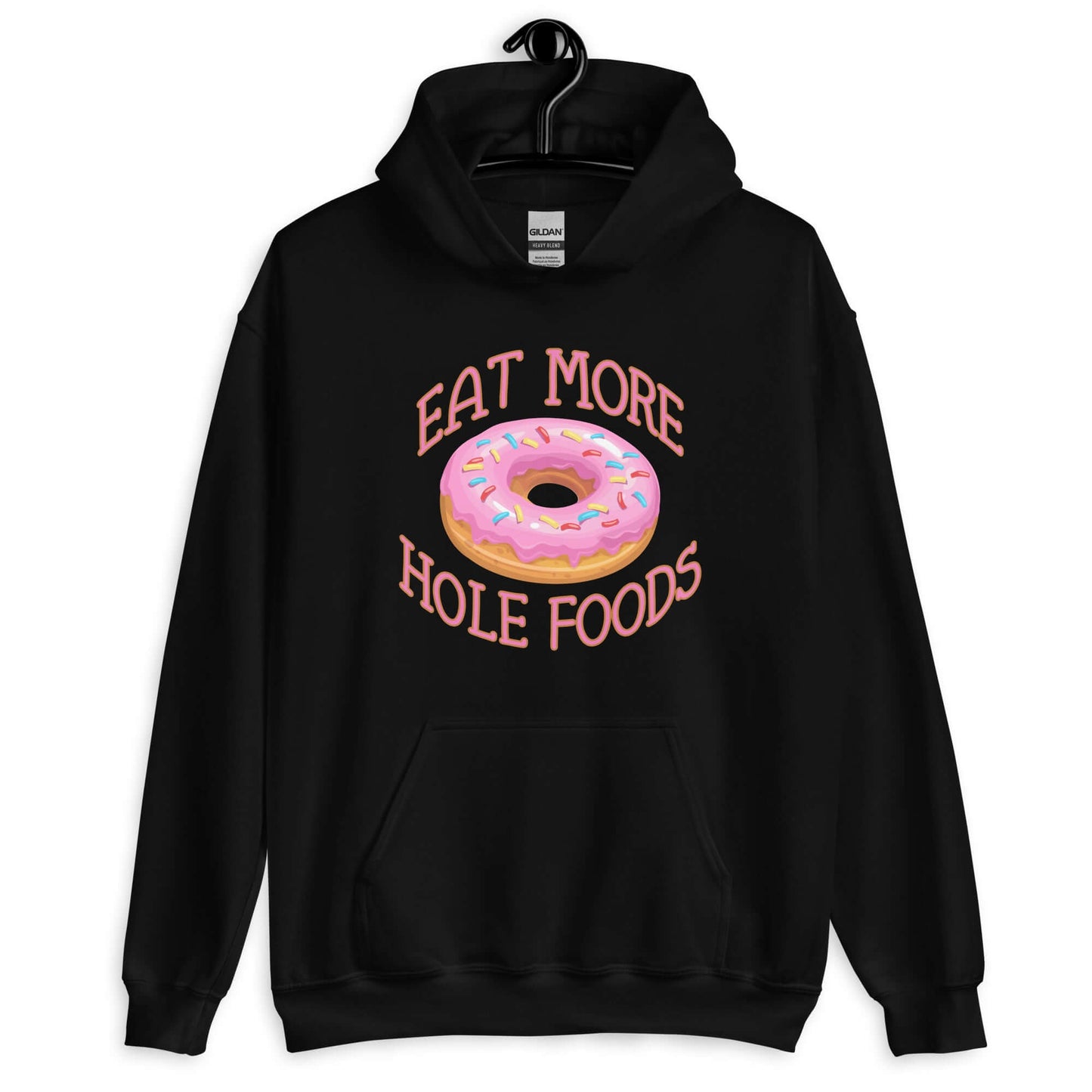Black hoodie sweatshirt with an image of a donut with pink icing and sprinkles and the words Eat more hole foods printed on the front.
