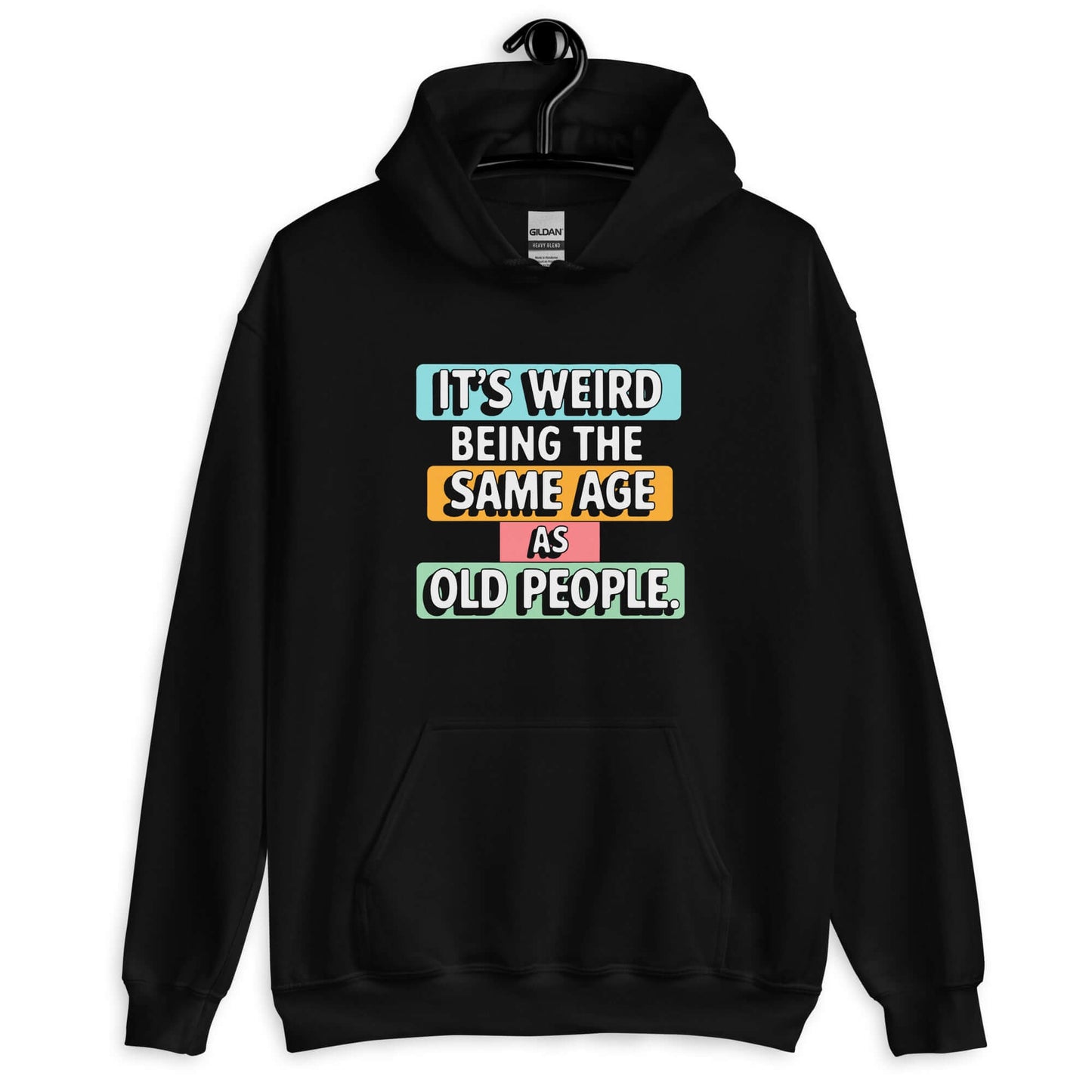 Black hoodie sweatshirt with colorful graphics that say It's weird being the same age as old people printed on the front.