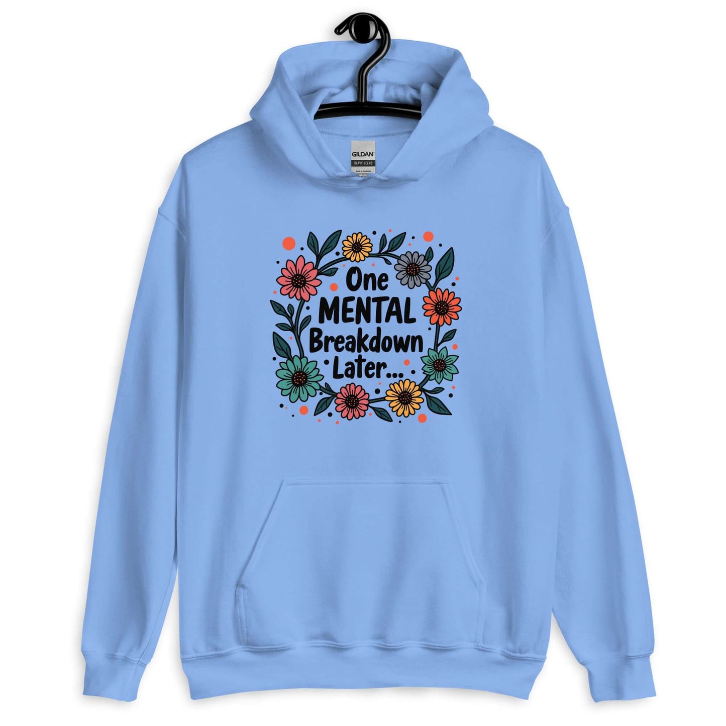 Carolina blue hoodie sweatshirt with a multi color floral wreath design printed on the front. The words One mental breakdown later are printed in the center of the wreath.
