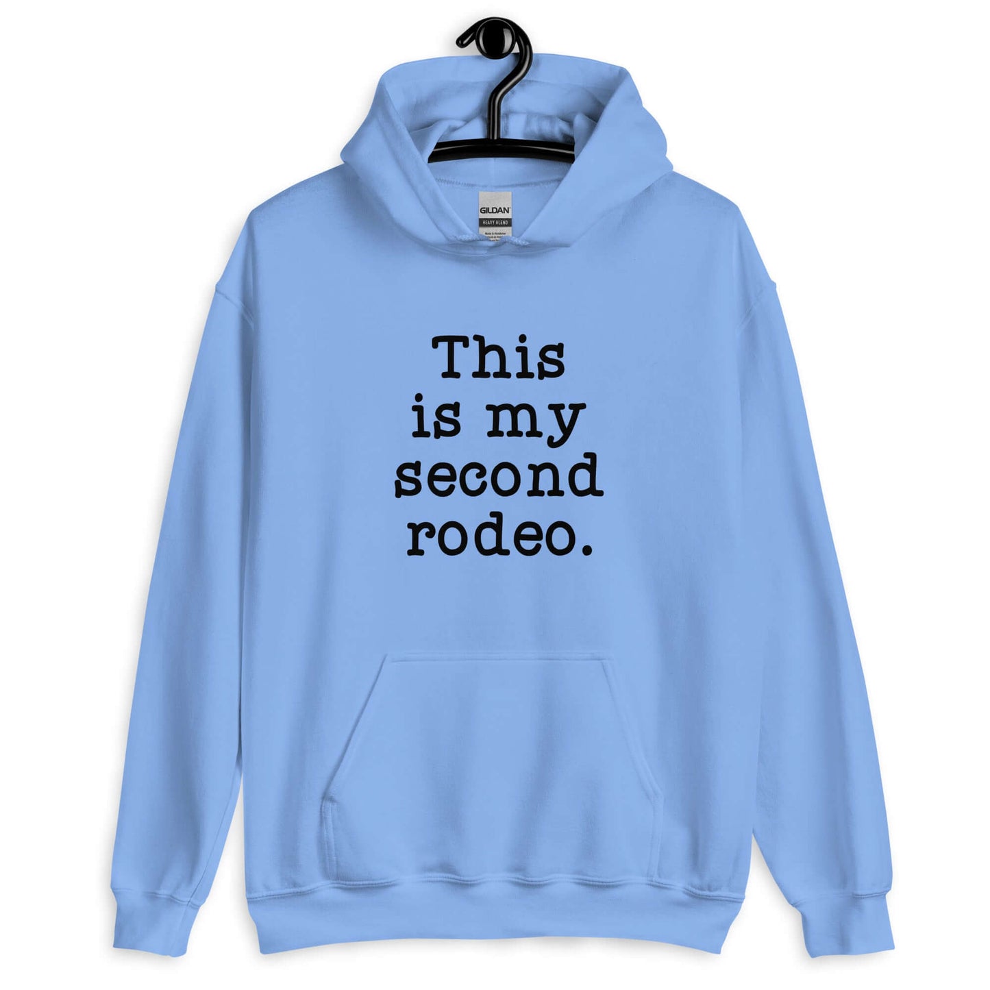 Carolina blue hoodie sweatshirt with the funny phrase This is my second rodeo printed on the front.