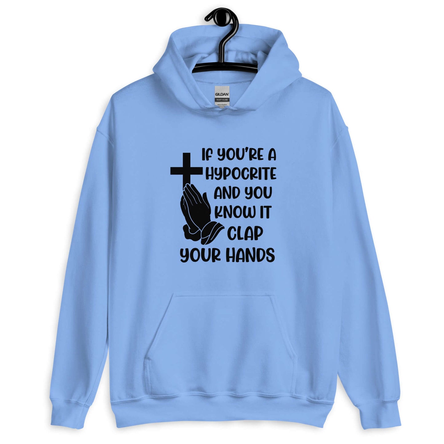 Carolina blue hoodie sweatshirt with image of a cross and praying hands & the phrase If you're a hypocrite and you know it clap your hands printed on the front.