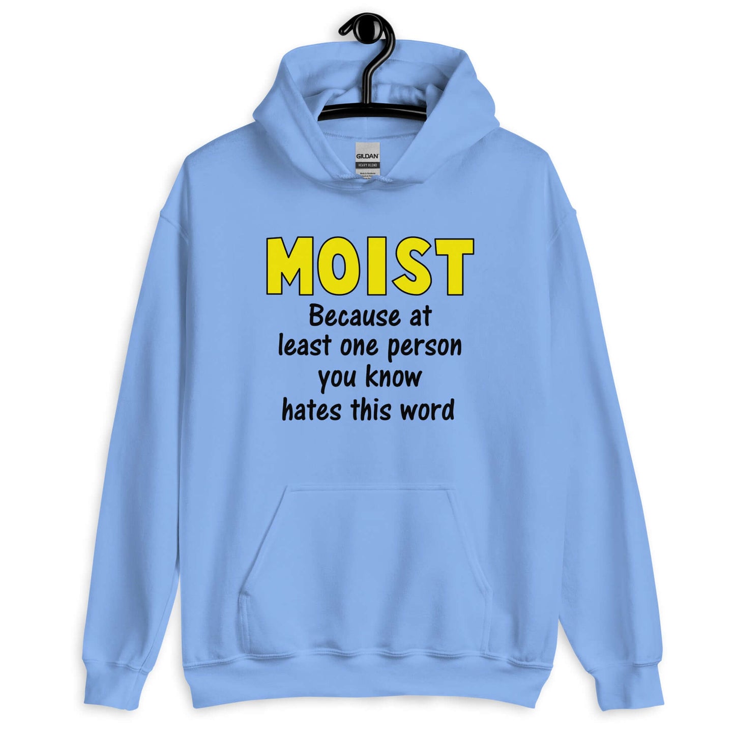 Carolina blue hoodie sweatshirt with the word Moist printed in large yellow bold font. In smaller font under the word moist is the phrase Because at least one person you know hates this word.