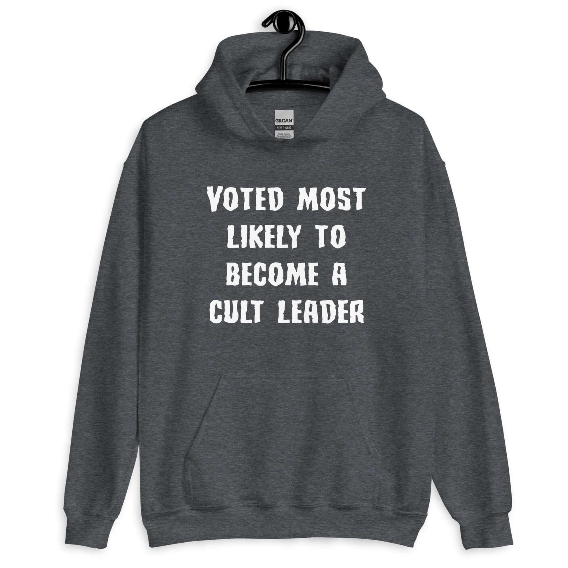 Dark heather hoodie sweatshirt with the phrase Voted most likely to become a cult leader printed on the front.