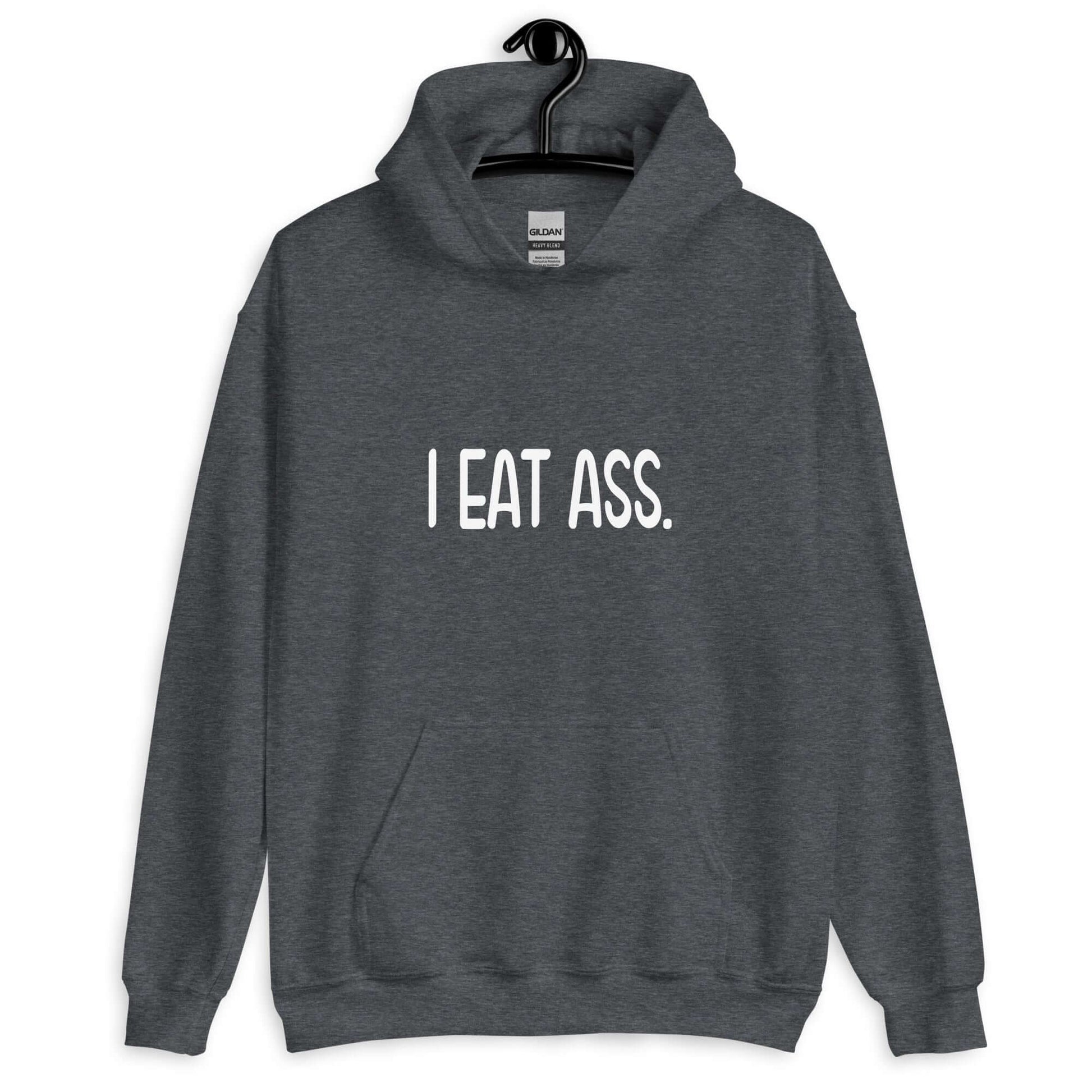 Dark heather grey hoodie sweatshirt with the phrase I eat ass printed on the front.