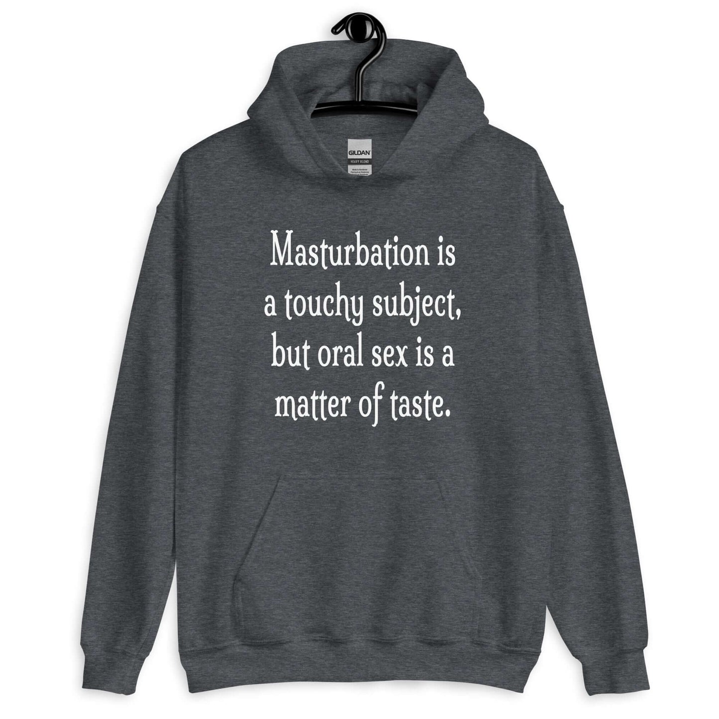 Dark heather hoodie sweatshirt with the suggestive phrase Masturbation is a touchy subject, but oral sex is a matter of taste printed on the front.