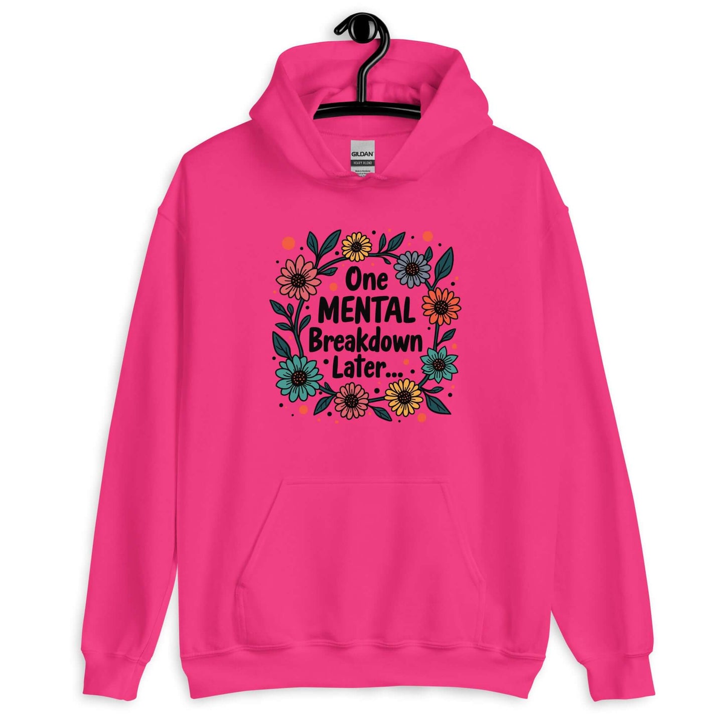 Heliconia pink hoodie sweatshirt with a multi color floral wreath design printed on the front. The words One mental breakdown later are printed in the center of the wreath.