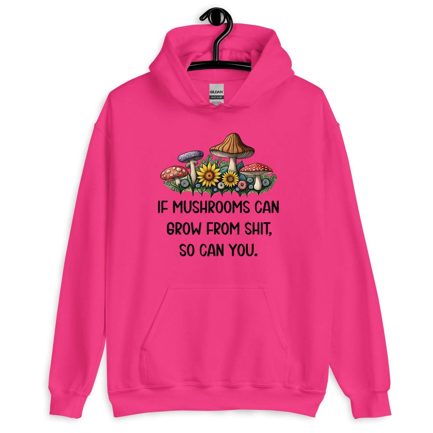 Heliconia pink hoodie sweatshirt with images of mushrooms and the phrase If mushrooms can grow from shit so can you printed on the front.