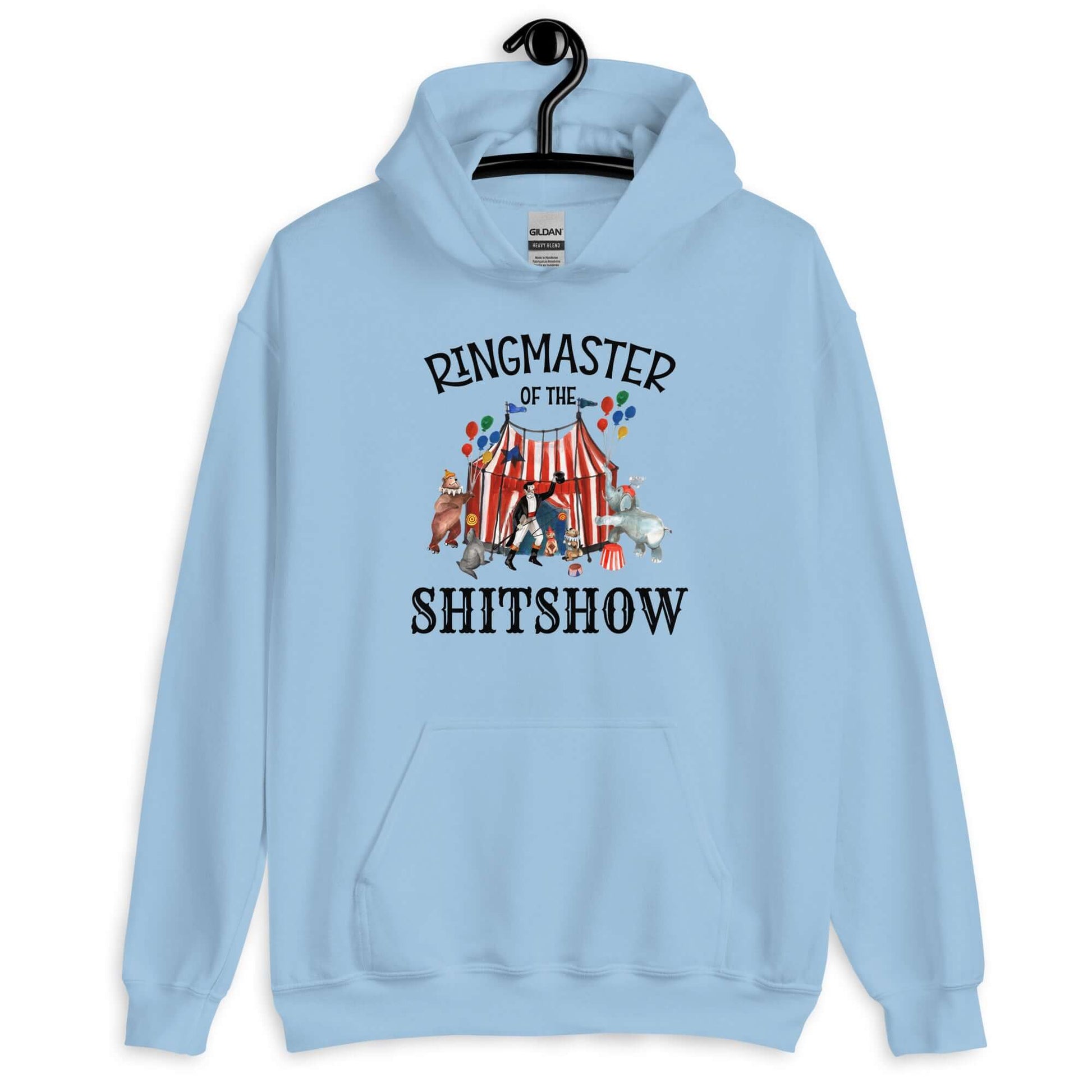 Light blue hoodie sweatshirt with a circus theme graphic and the words Ringmaster of the Shitshow printed on the front.