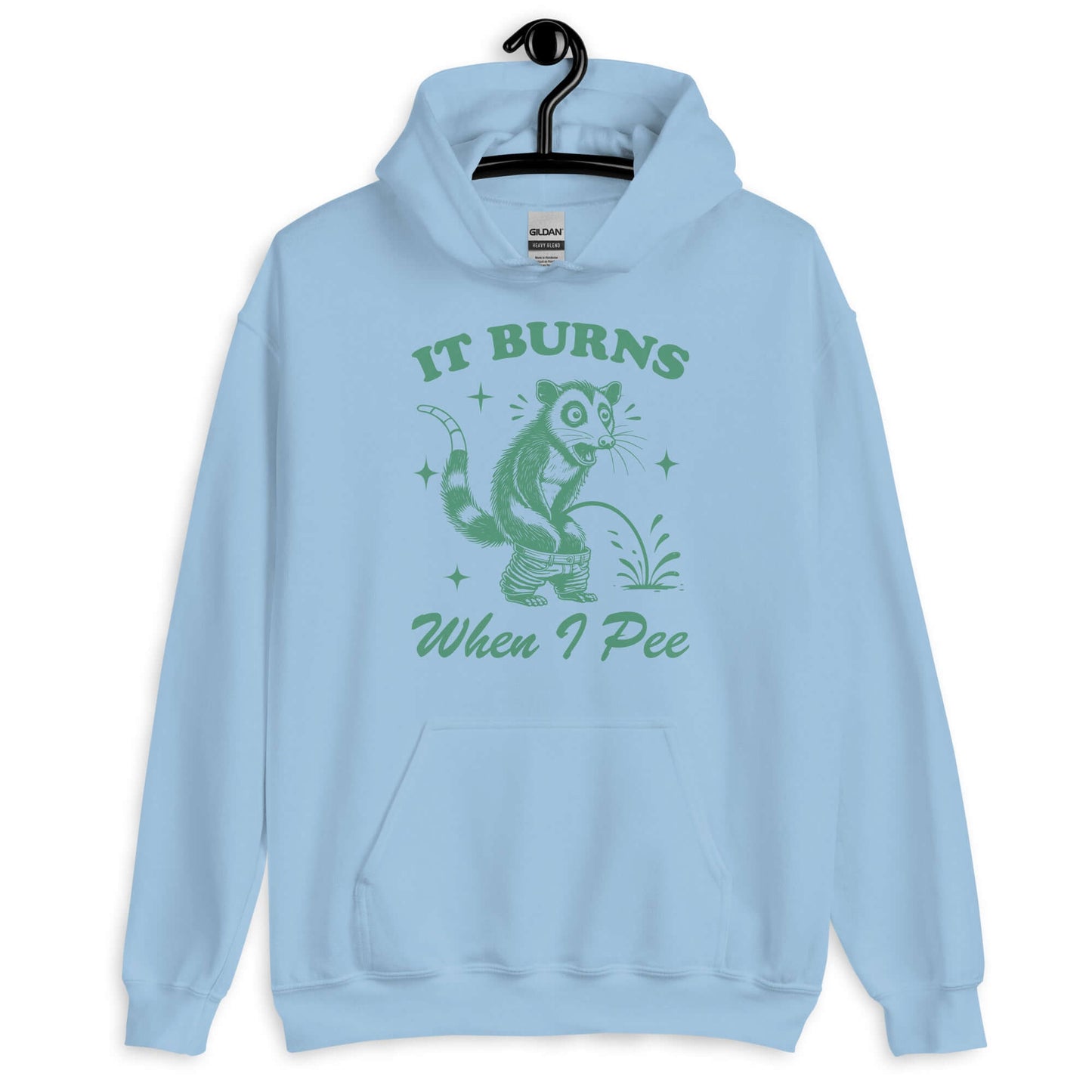 Light blue hoodie sweatshirt that has graphic of an opossum peeing and the words it burns when I pee printed on the front.