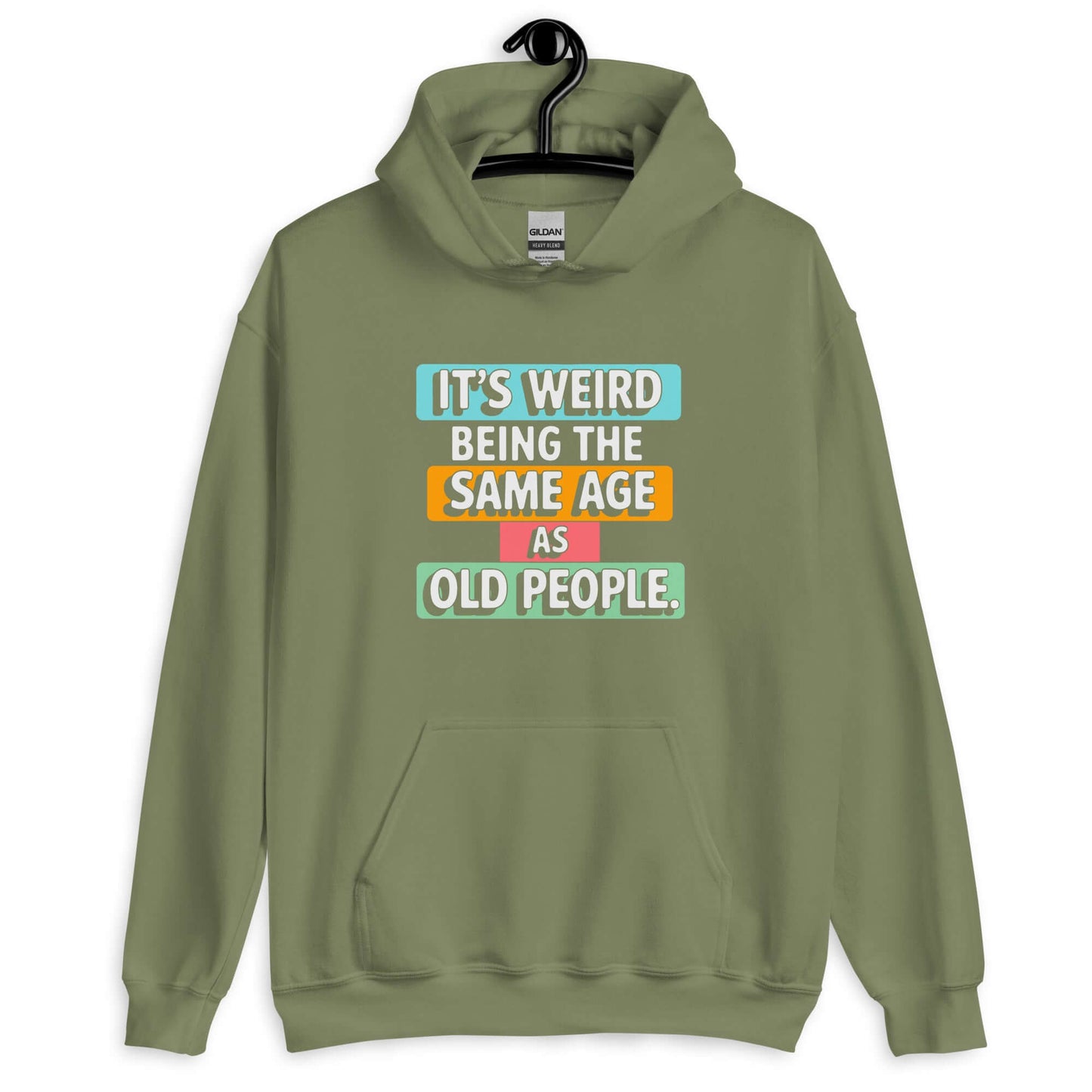 Military green hoodie sweatshirt with colorful graphics that say It's weird being the same age as old people printed on the front.