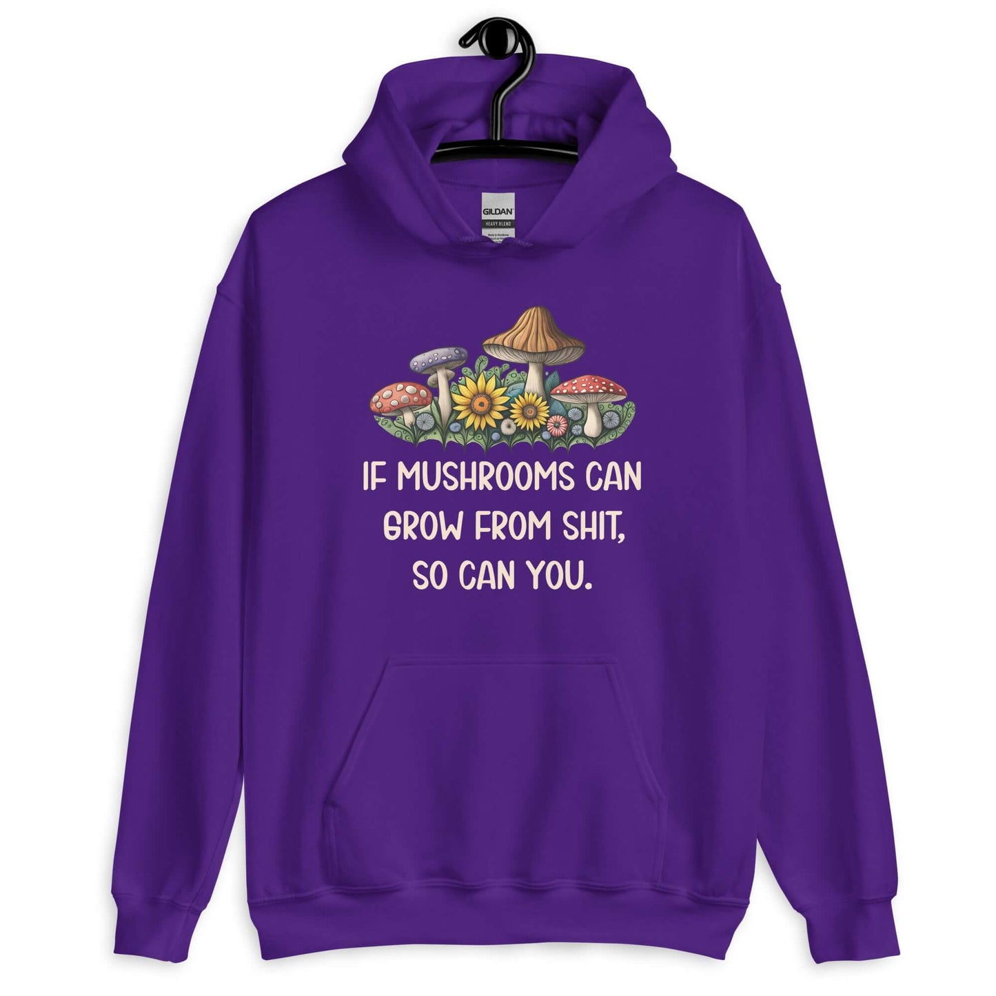 Purple hoodie sweatshirt with images of mushrooms and the phrase If mushrooms can grow from shit so can you printed on the front.