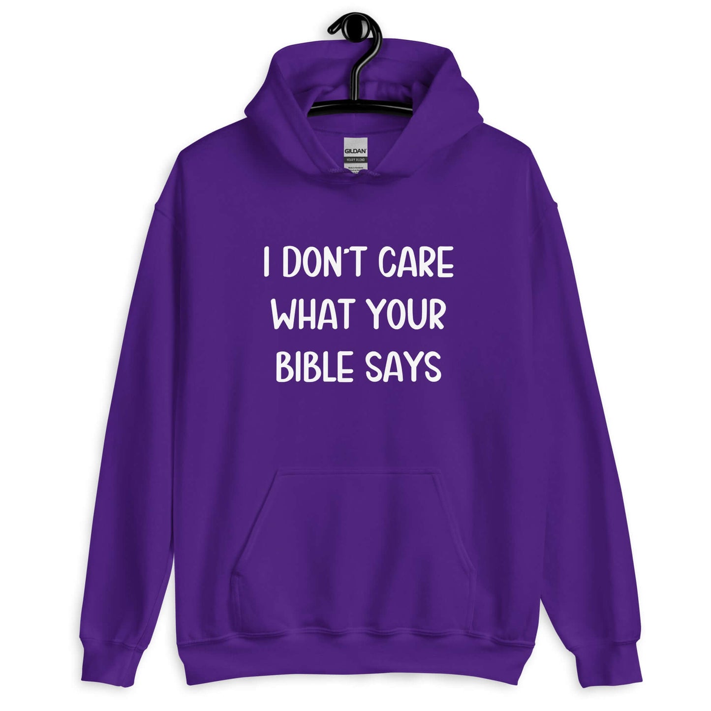 Purple hoodie sweatshirt with the phrase I don't care what your bible says printed on the front.