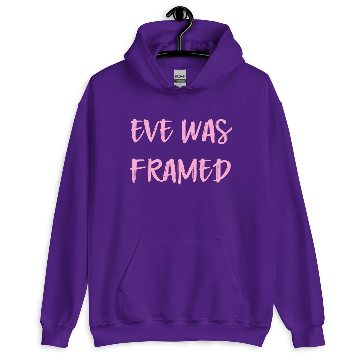 Purple hoodie sweatshirt with the words Eve was framed printed on the front in pink.