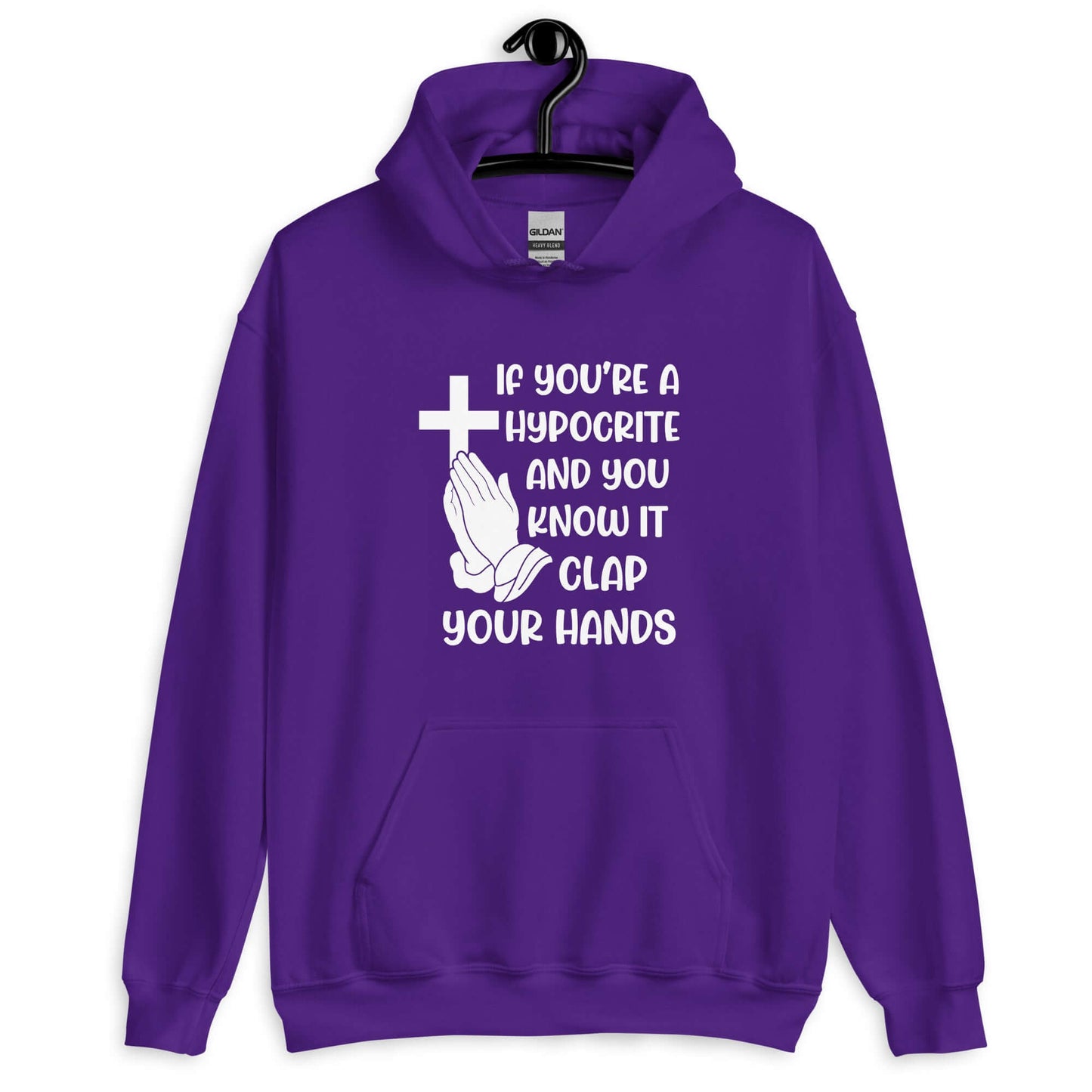 Purple hoodie sweatshirt with image of a cross and praying hands & the phrase If you're a hypocrite and you know it clap your hands printed on the front.