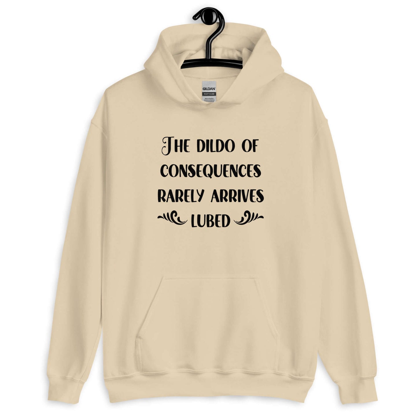 Sand color hoodie sweatshirt with the phrase The dildo of consequences rarely arrives lubed printed on the front.