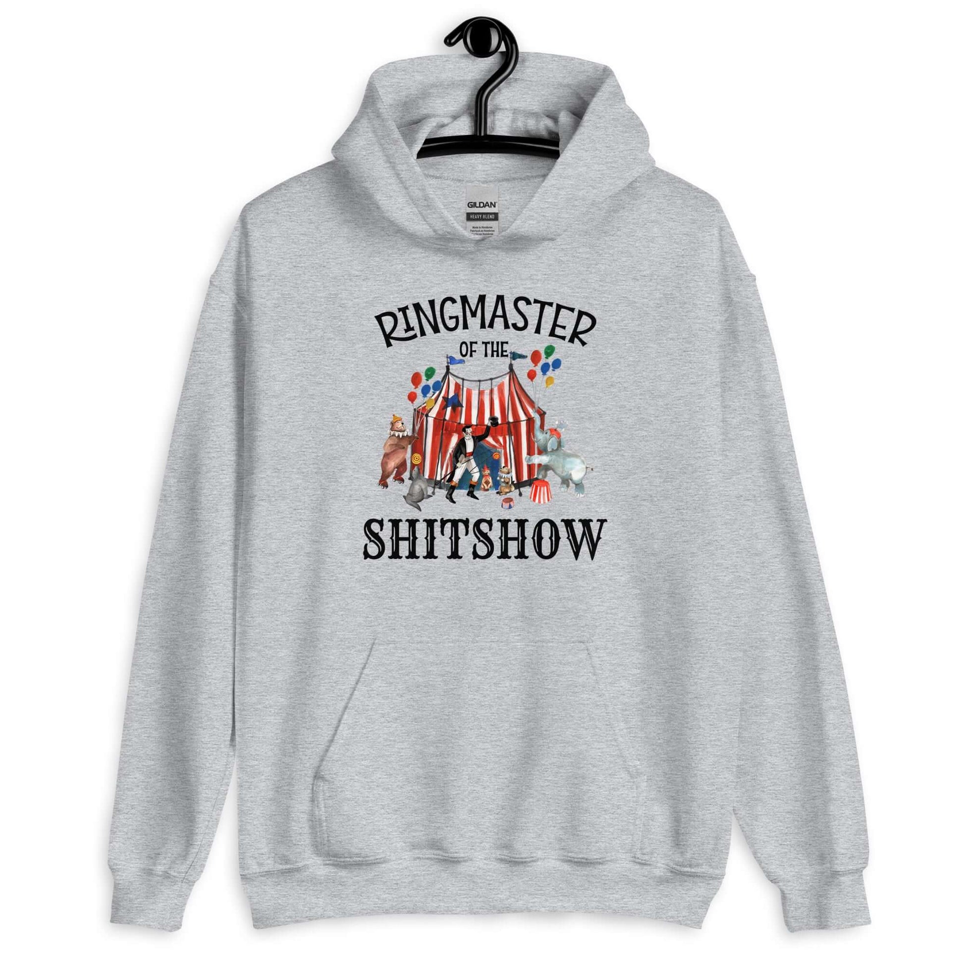 Sport grey hoodie sweatshirt with a circus theme graphic and the words Ringmaster of the Shitshow printed on the front.