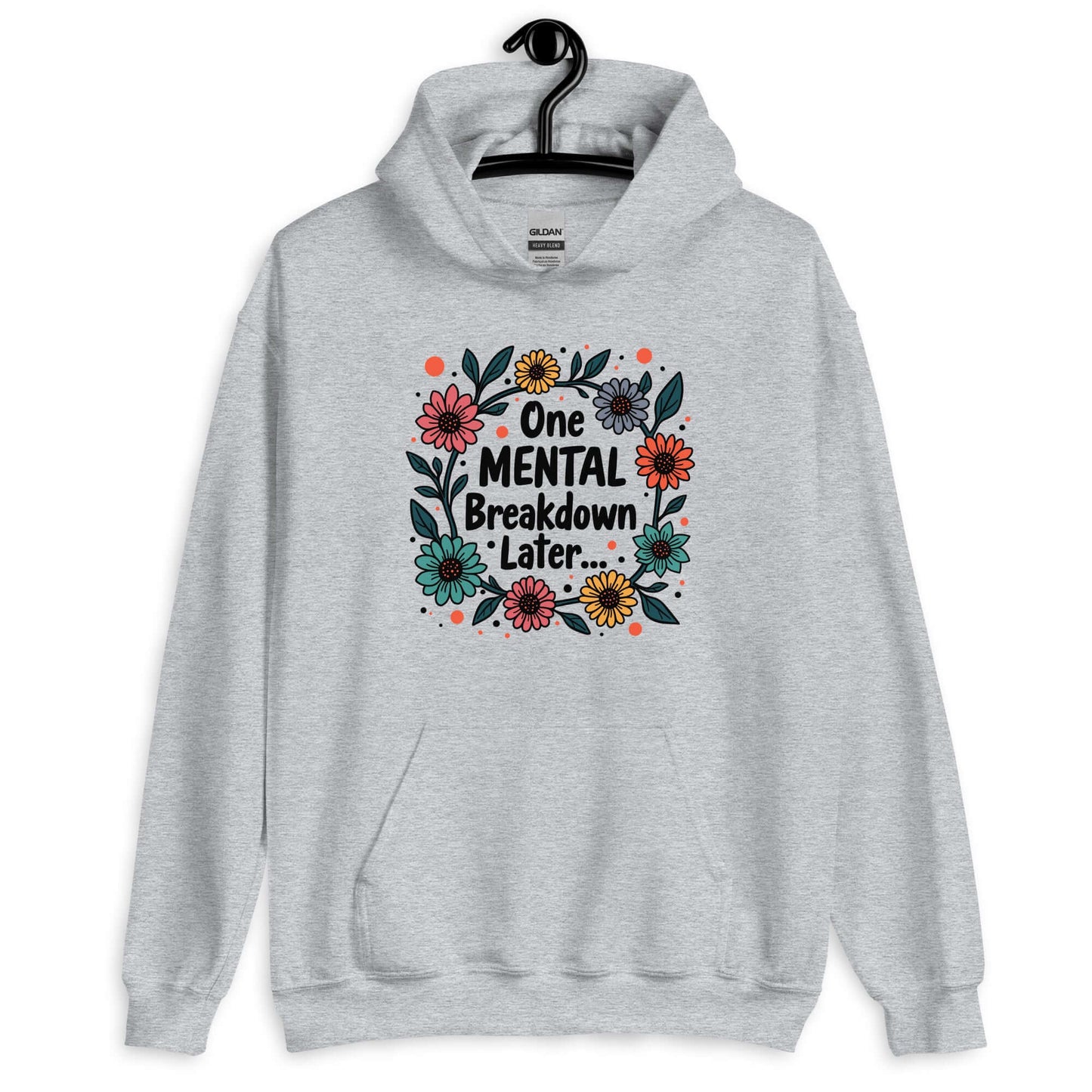 Sport grey hoodie sweatshirt with a multi color floral wreath design printed on the front. The words One mental breakdown later are printed in the center of the wreath.