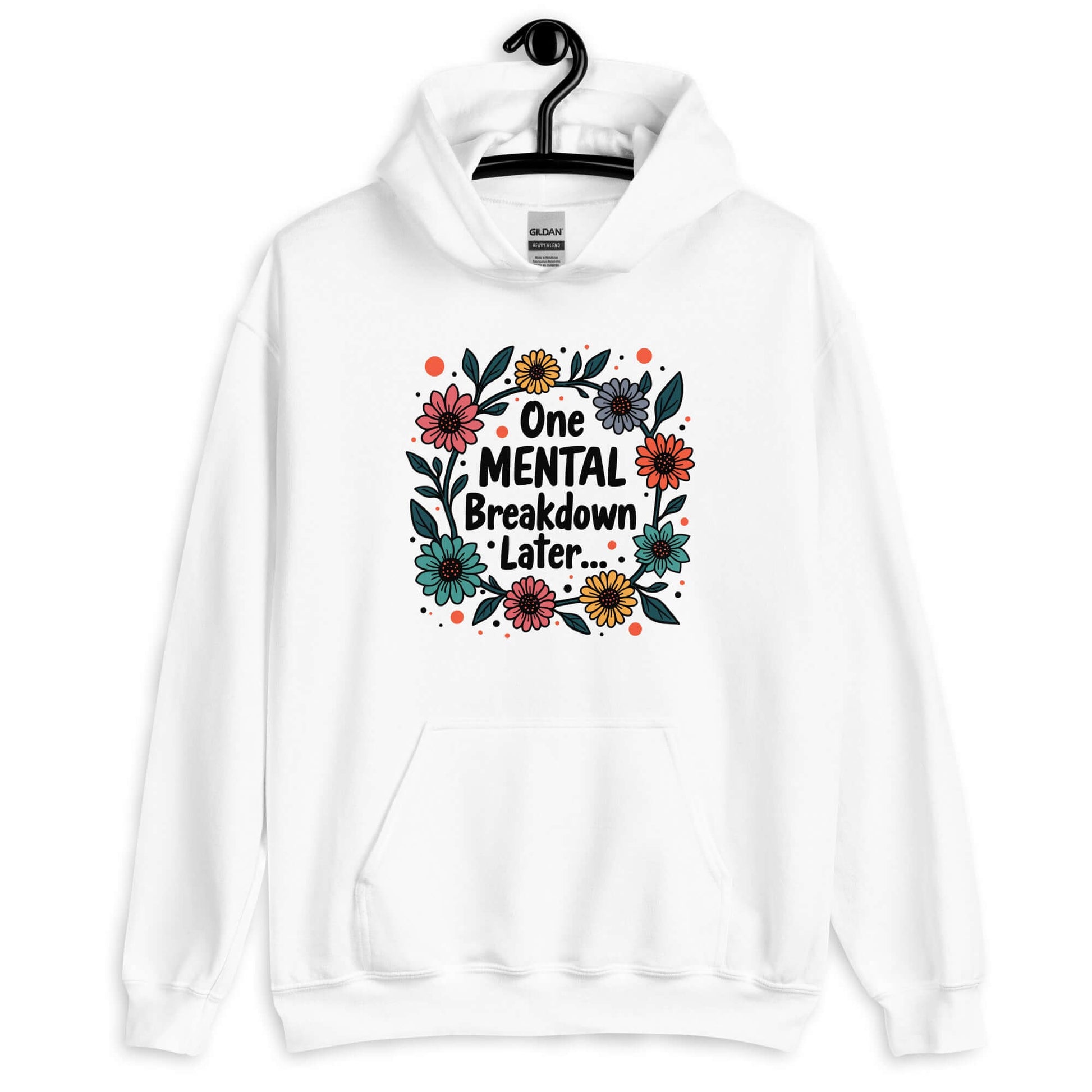 White hoodie sweatshirt with a multi color floral wreath design printed on the front. The words One mental breakdown later are printed in the center of the wreath.