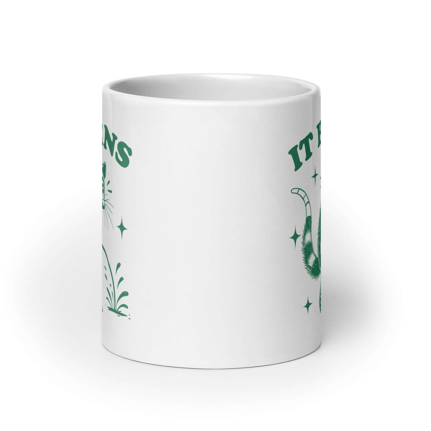 White ceramic mug with an image of an opossum peeing. The words It burns are printed above.