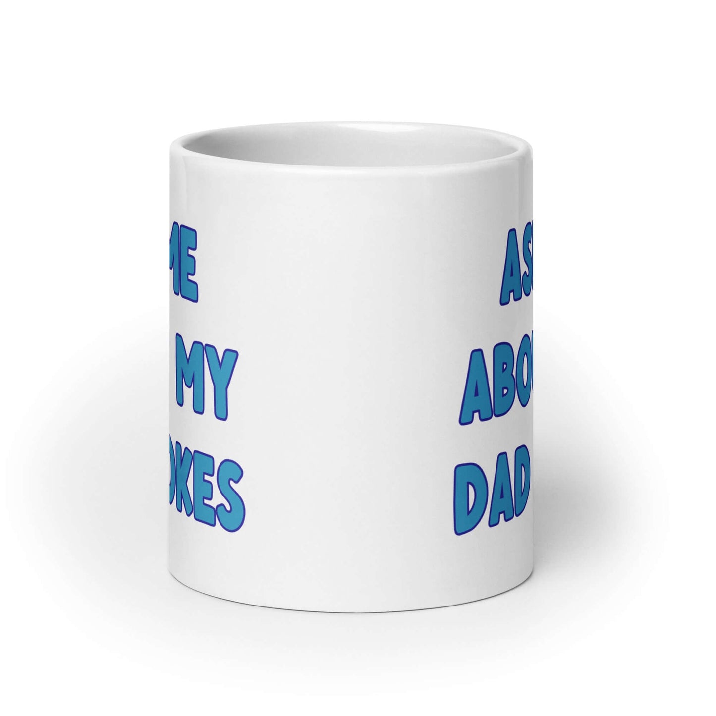 White ceramic coffee mug with the words Ask me about my Dad jokes printed on both sides.