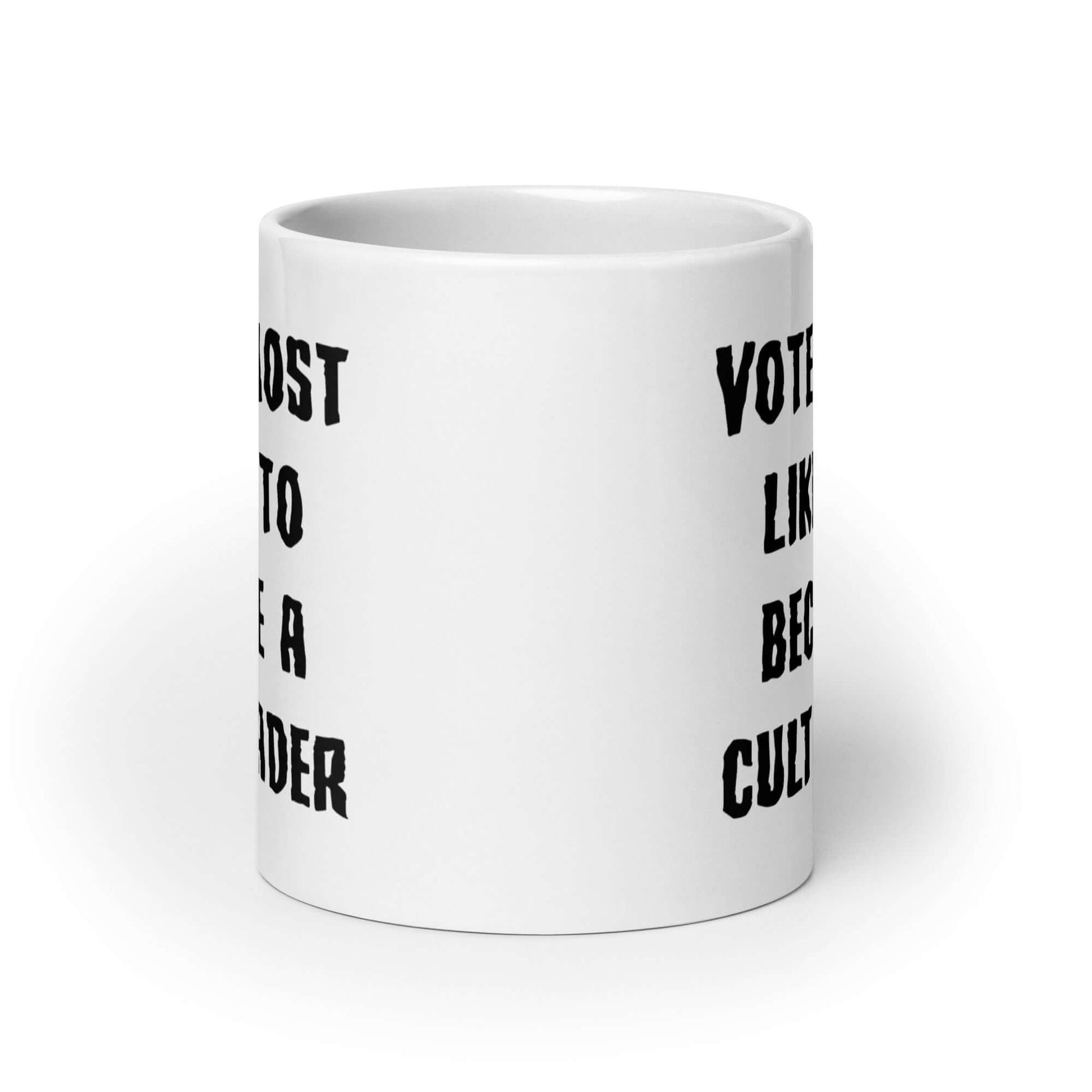 White ceramic mug with the words Voted most likely to become a cult leader printed on both sides.
