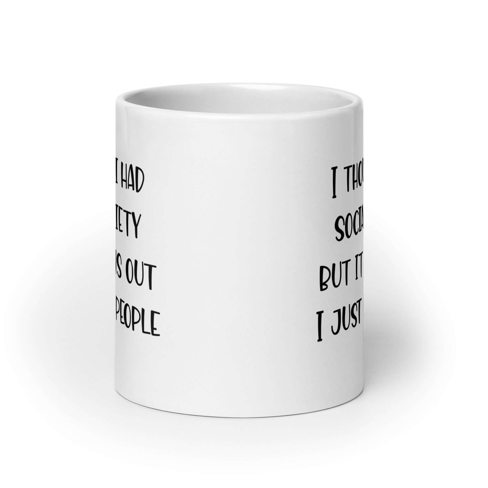 White ceramic coffee mug with the phrase I thought I had social anxiety but it turns out I just hate people printed on both sides.